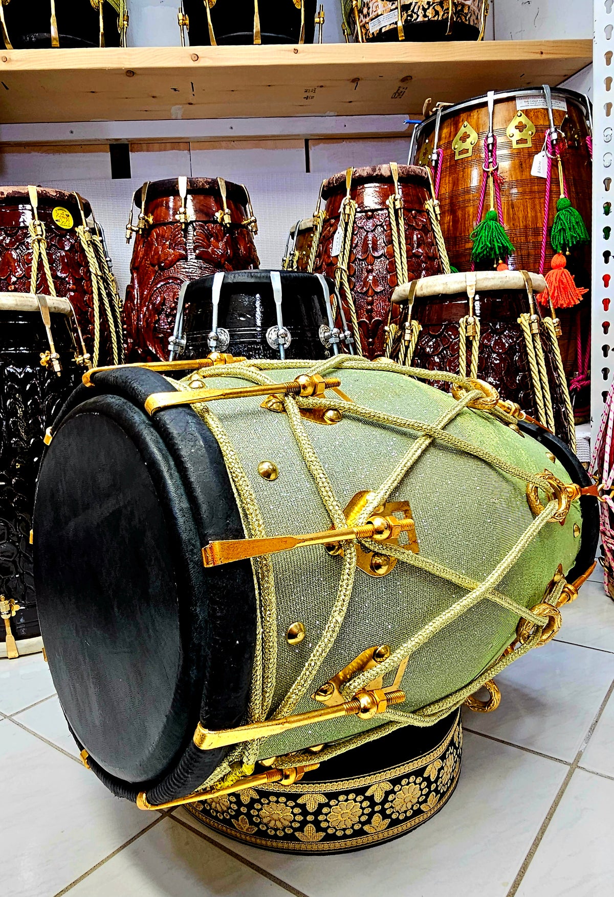 Radiant Rhythms: Sparkly Sherwani Wrapped Red Sheesham Dholak with Golden Brass Bolts and Black Pudis (Minor Fabric Rip Defects)