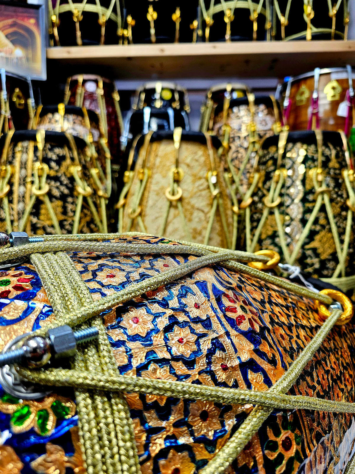 Harmony in Hues: Blue and Gold Designer Wrapped Red Sheesham Dholak with Black Skins and Chrome Bolts