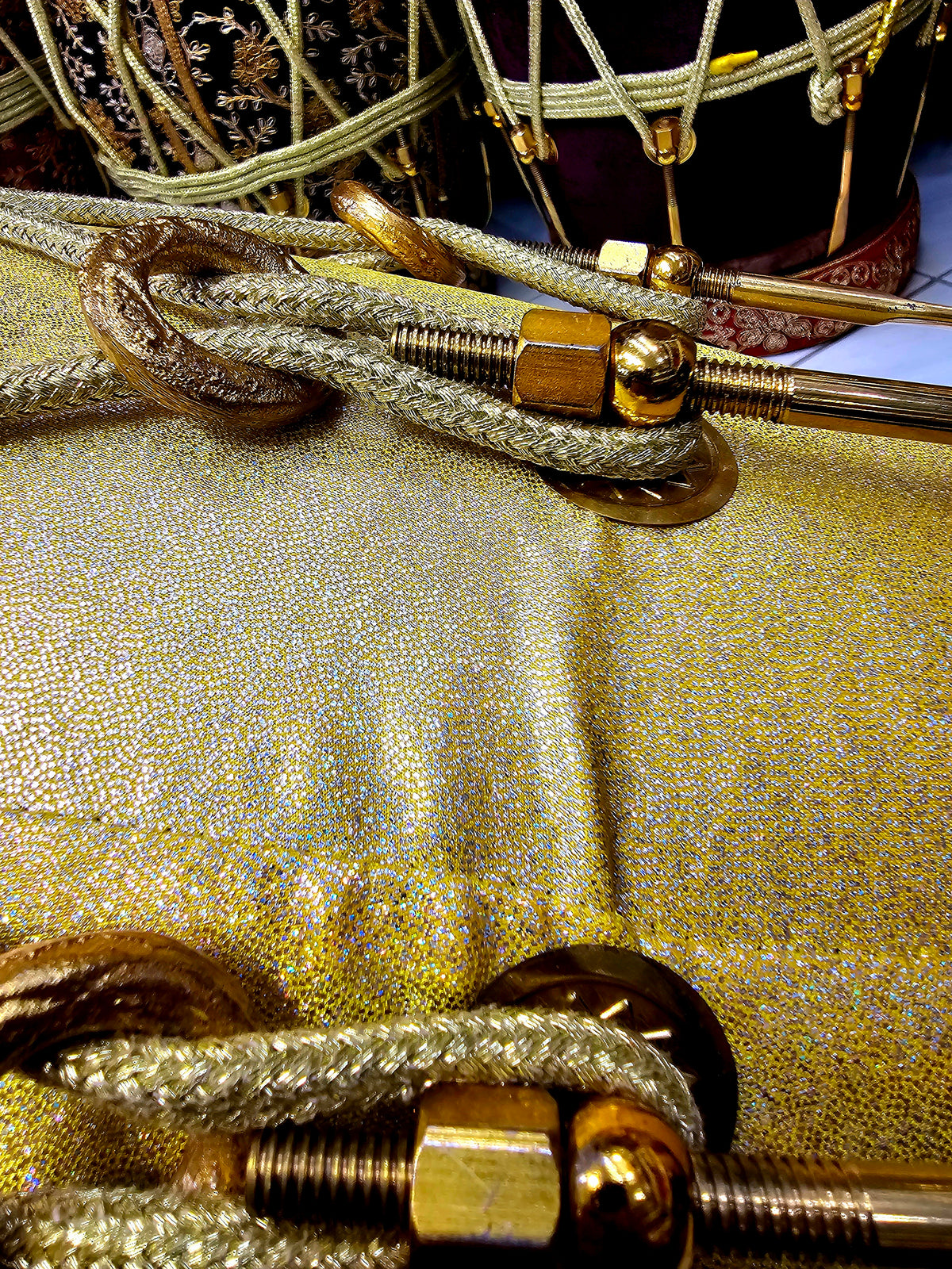 Radiant Rhythms: Golden Sparkly Wrapped Red Sheesham Dholak with Black Skins, Thin-Rimmed Treble Skin, and Golden Accents - *Slightly Imperfect Wrap