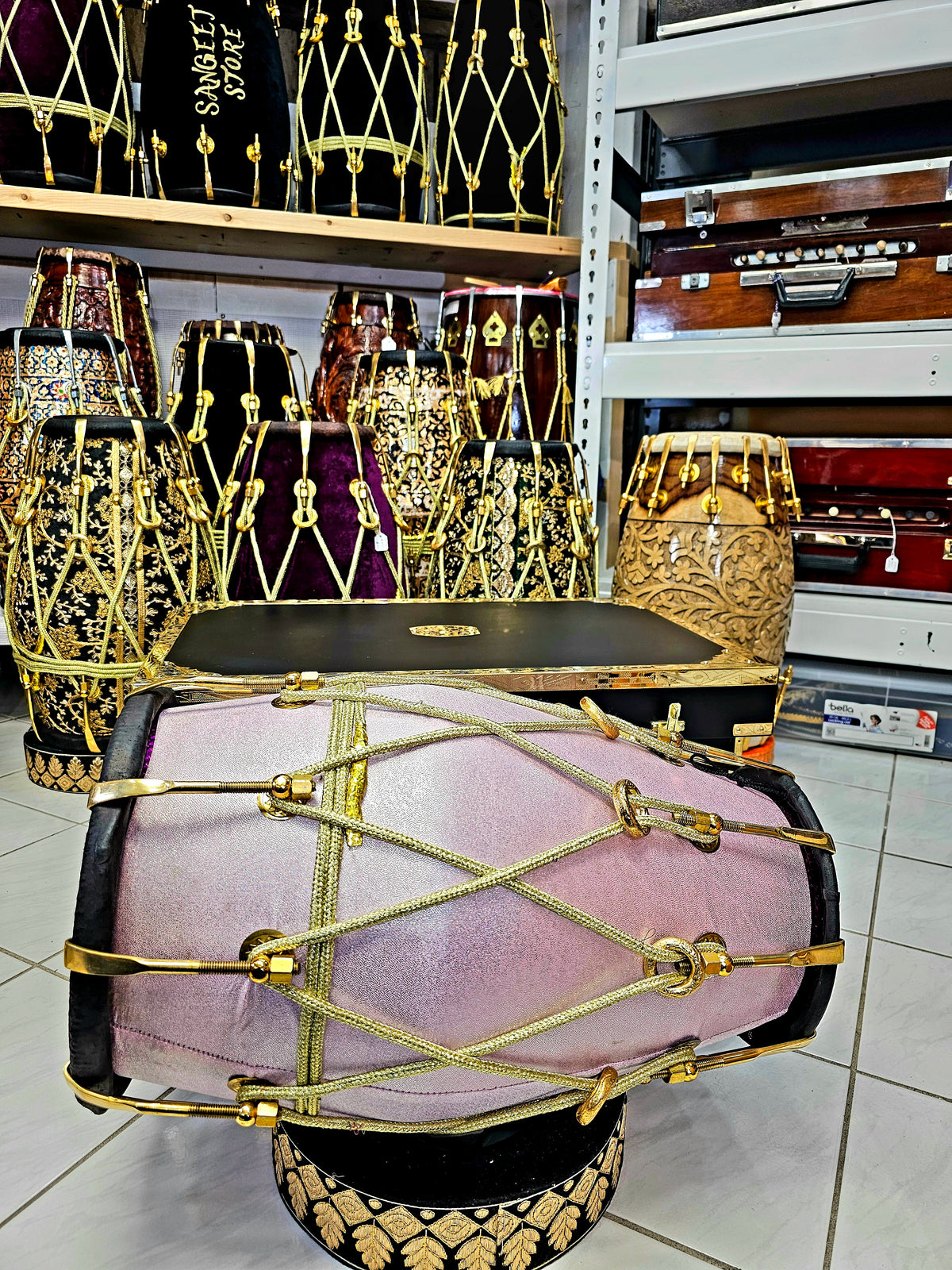 Enchanting Blush Sparkle: Red Sheesham Dholak in Sparkly Pink Wrap, Black Skins, Golden Brass Accents, and Intricate Golden Ropes