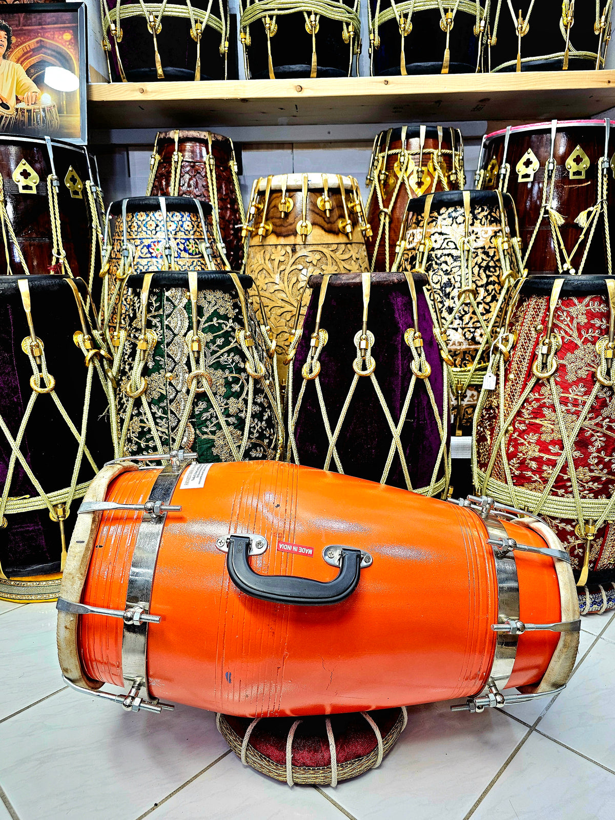Sunburst Prodigy: Large Orange Professional Mango Wood Dholak with Minor Filled-in Cracks