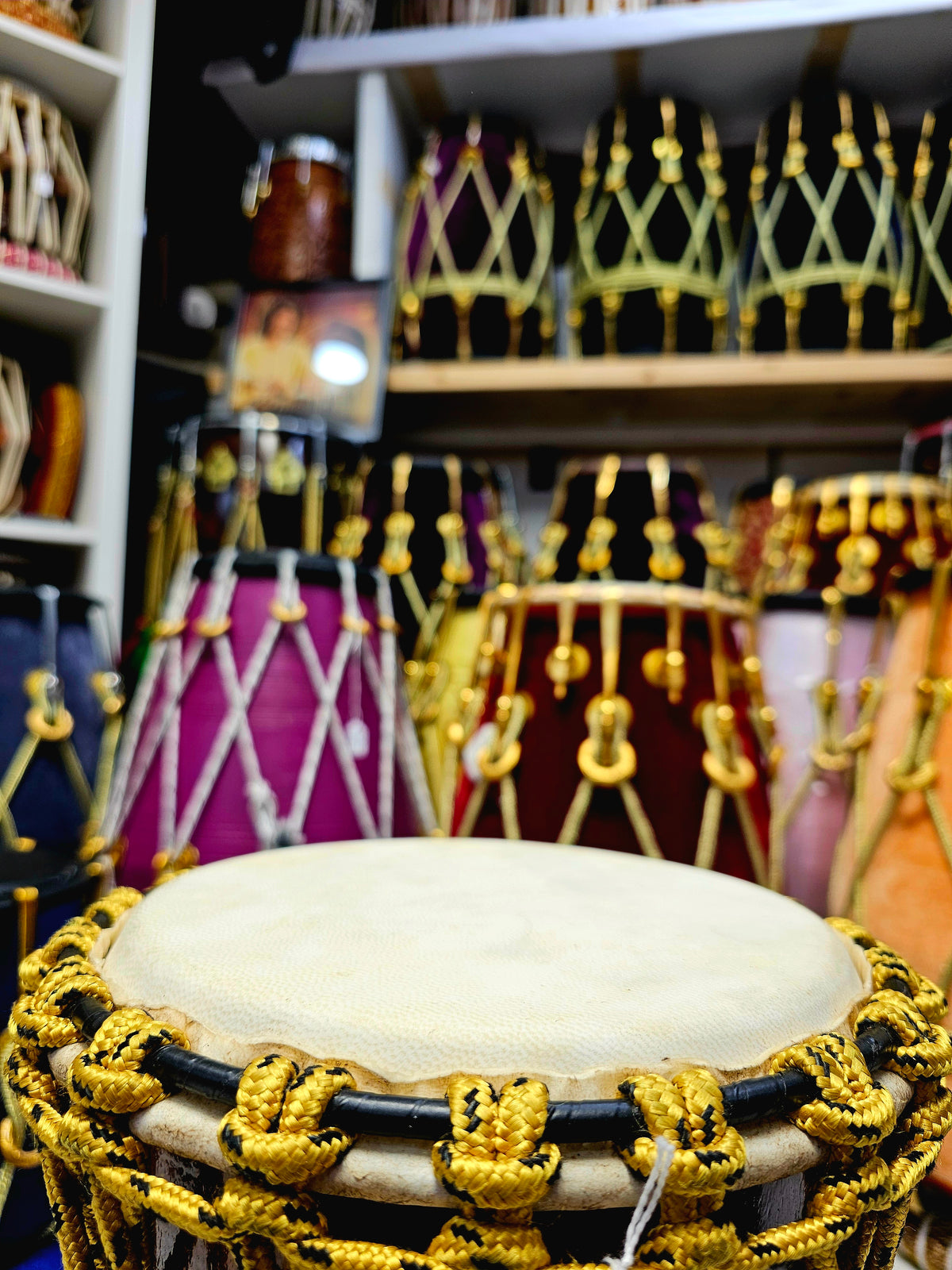 Sunset Serenity: Compact Engraved Red Sheesham Djembe with Yellow Ropes and Black Accents