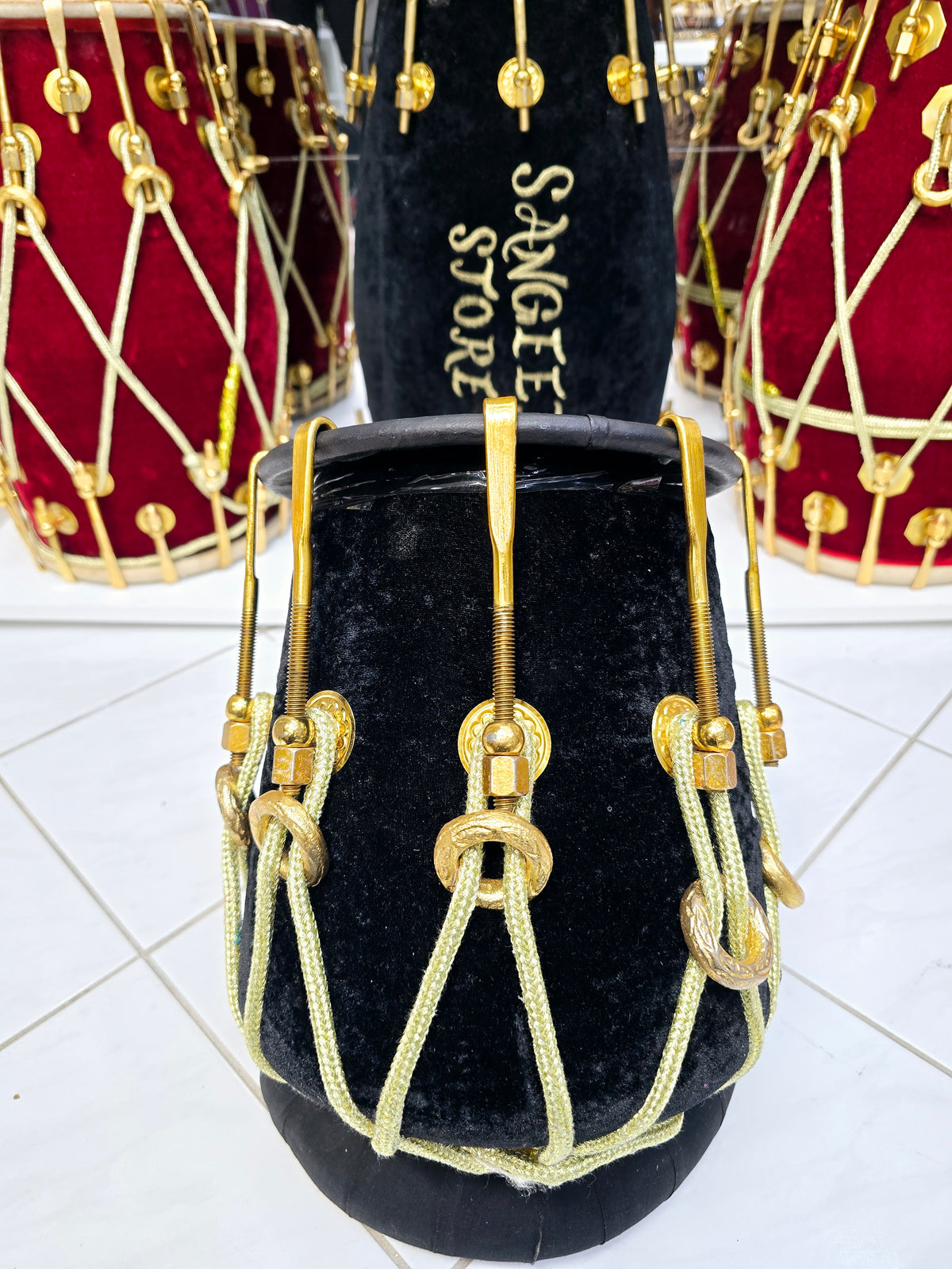 Eclipsed Harmony: Red Sheesham Dholki-Tone Half-Dholak with Black Velvet Wrap, Golden Brass Bolts, and Ebony Black Skin