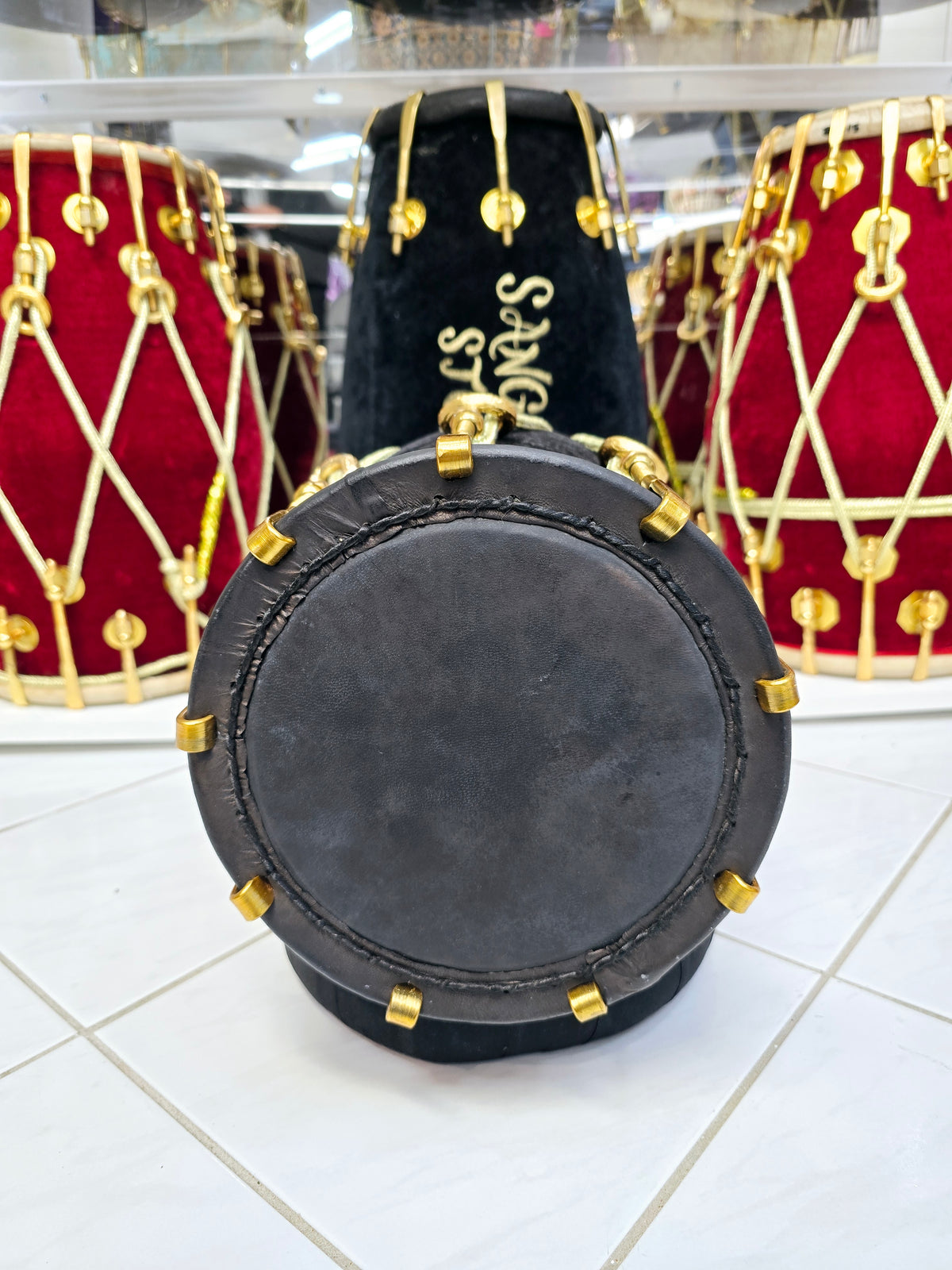 Eclipsed Harmony: Red Sheesham Dholki-Tone Half-Dholak with Black Velvet Wrap, Golden Brass Bolts, and Ebony Black Skin