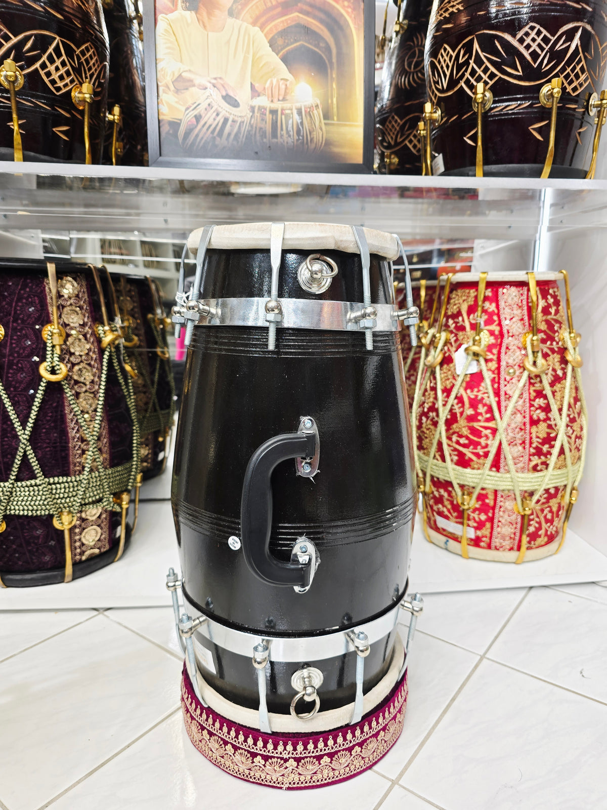 The Onyx Sonic Dholak - A Black Professional Red Sheesham Dholak with Chrome Bolts, Metal Rings and a Handle! Adj for Expedited shipping