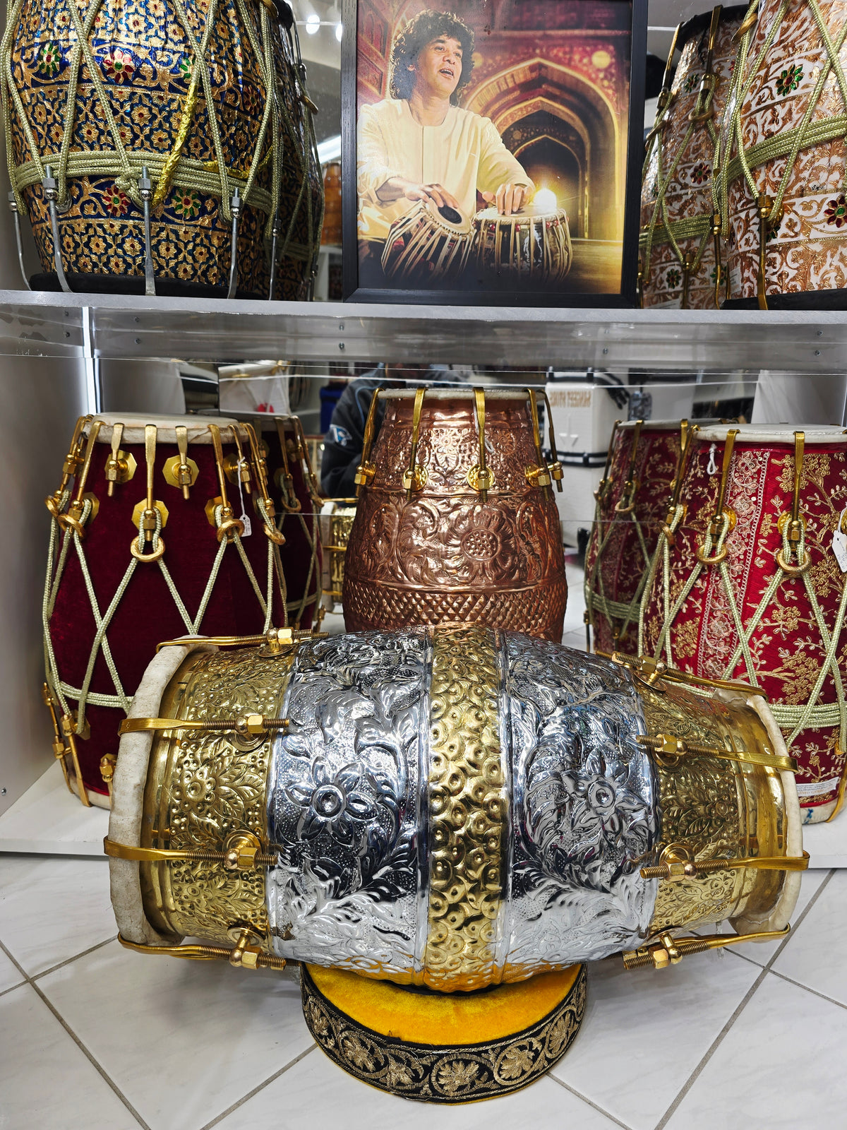 Udhyam's Package: SvarNāratna – The Encarved 15.6 LBS Copper Crown Dholak + Transparent Ghattas + Dholak Bags + Masala - Sangeet Store