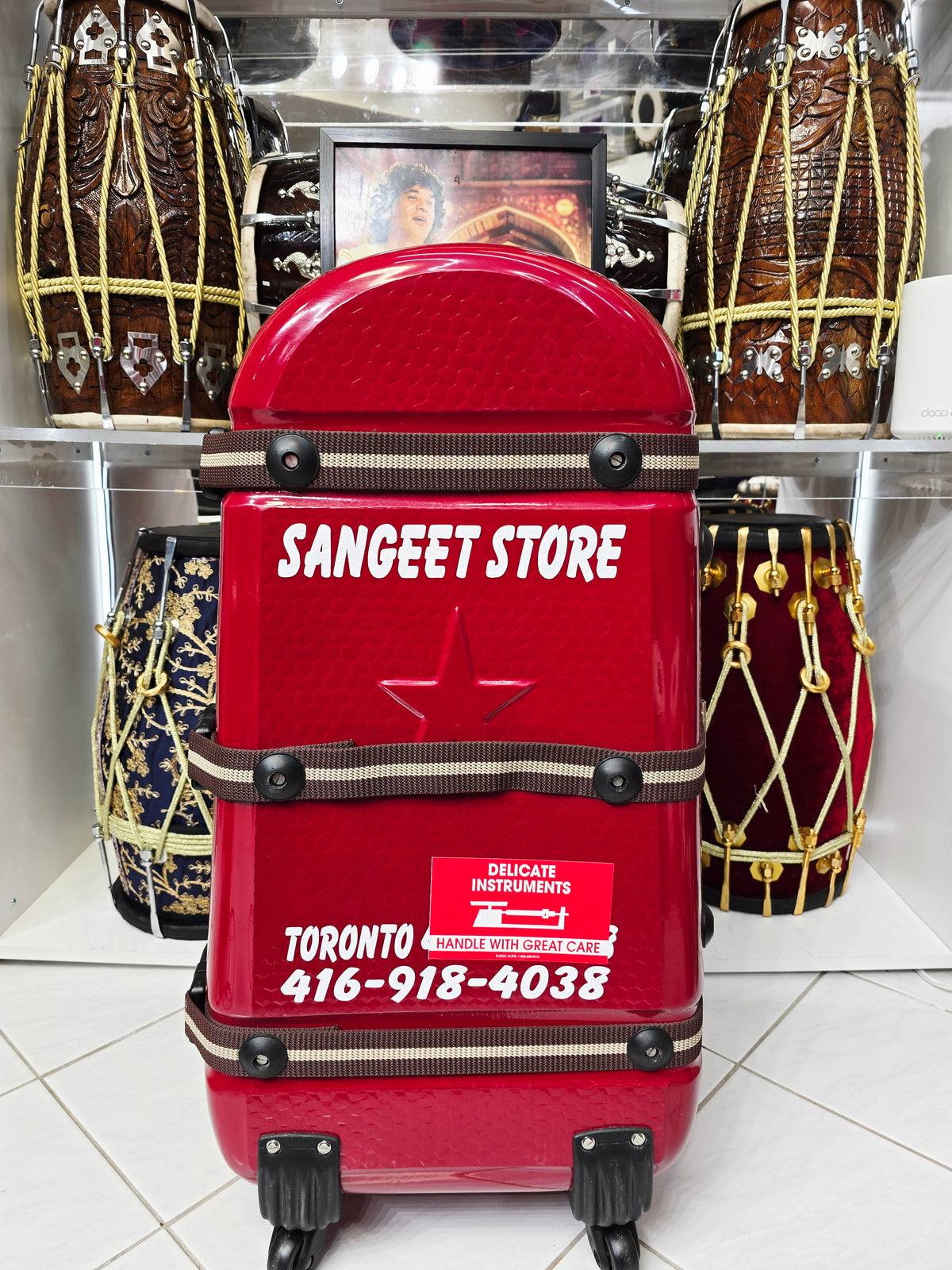 Redline Vault — Deep Red Tabla Hard Case · 360° Spinner Wheels · Dual Handles · Fixed Strap Bands · Very Minor Cosmetic Blemishes (g)