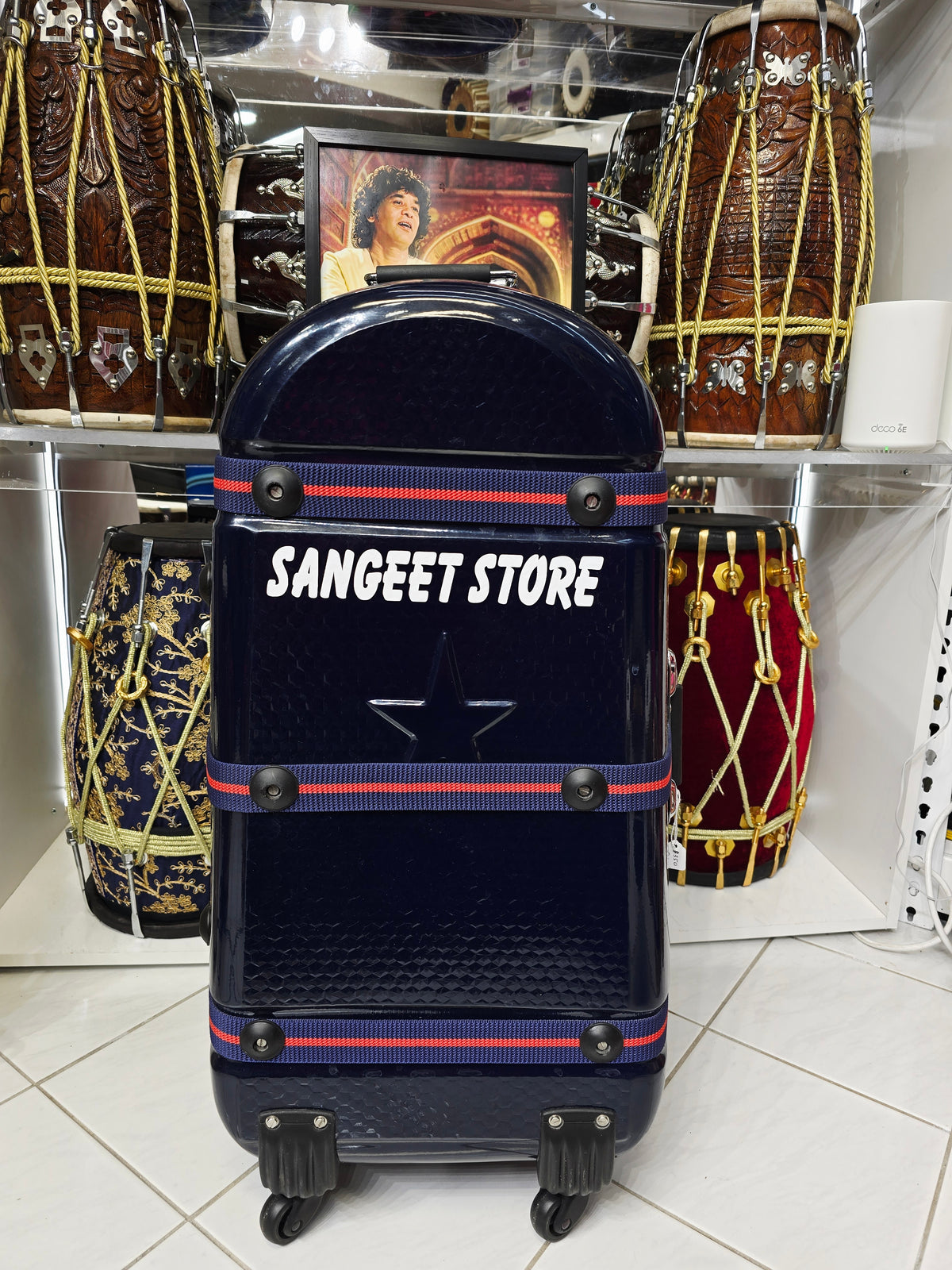 Midnight Relay — Deep Navy Tabla Travel Case · Red Accent Spine · 360° Spinner Wheels · Dual Handles · Fixed Reinforcement Bands · Very Minor Cosmetic Blemishes (g)