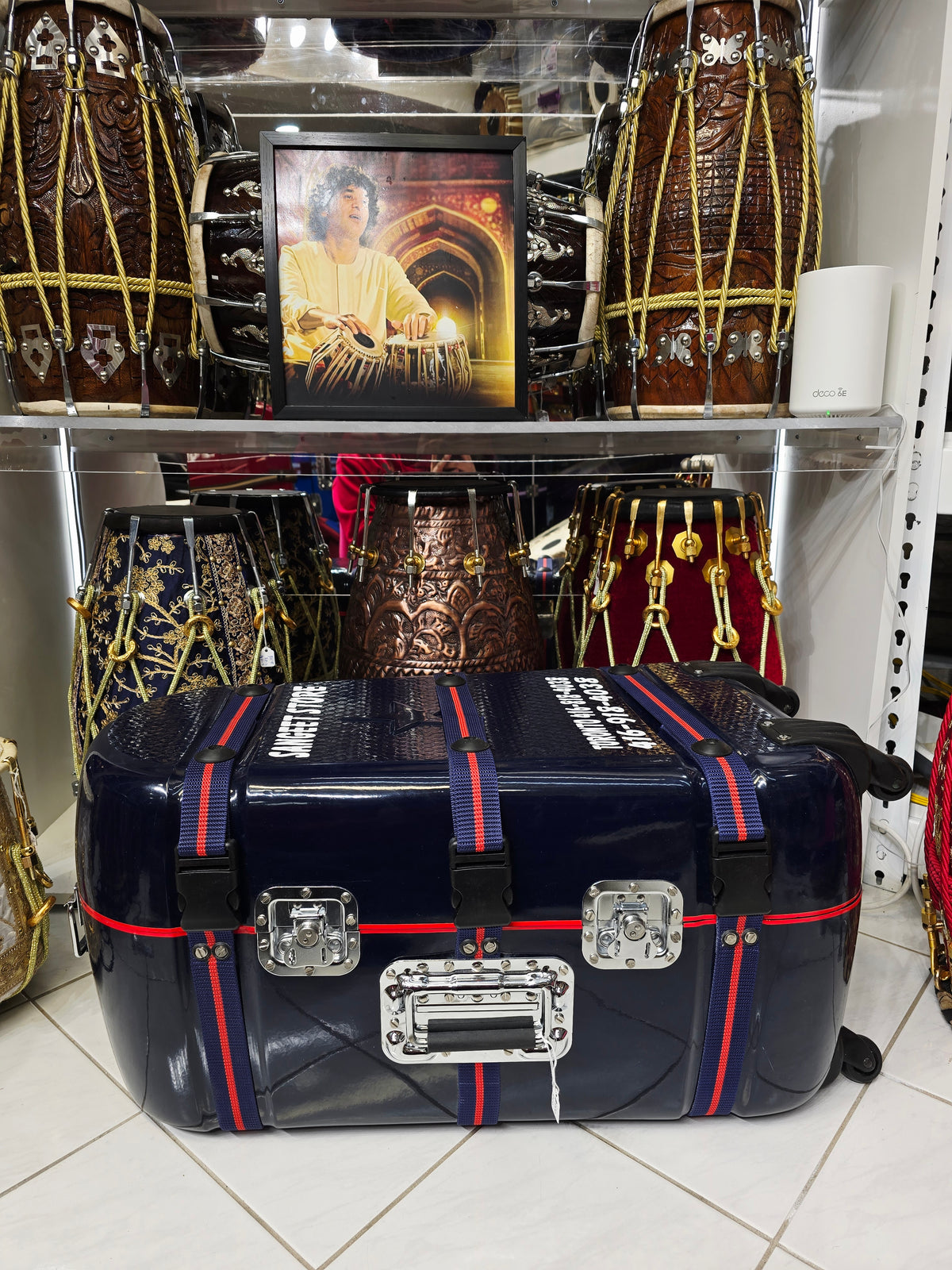 Midnight Relay — Deep Navy Tabla Travel Case · Red Accent Spine · 360° Spinner Wheels · Dual Handles · Fixed Reinforcement Bands · Very Minor Cosmetic Blemishes (g)