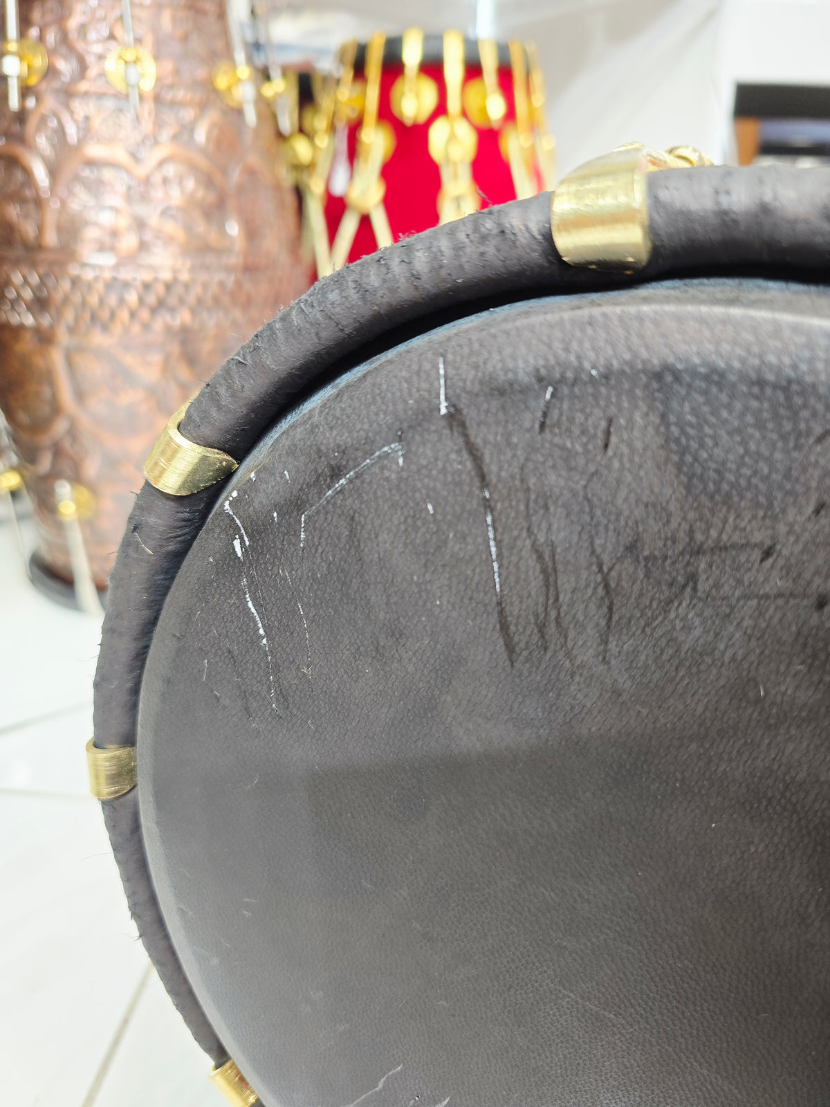 Zarif Noor — Black Sherwani-Wrapped Red Sheesham Dholak · Gold Roping · Traditional Tuning · Minor Cosmetic Defect on Bass Skin