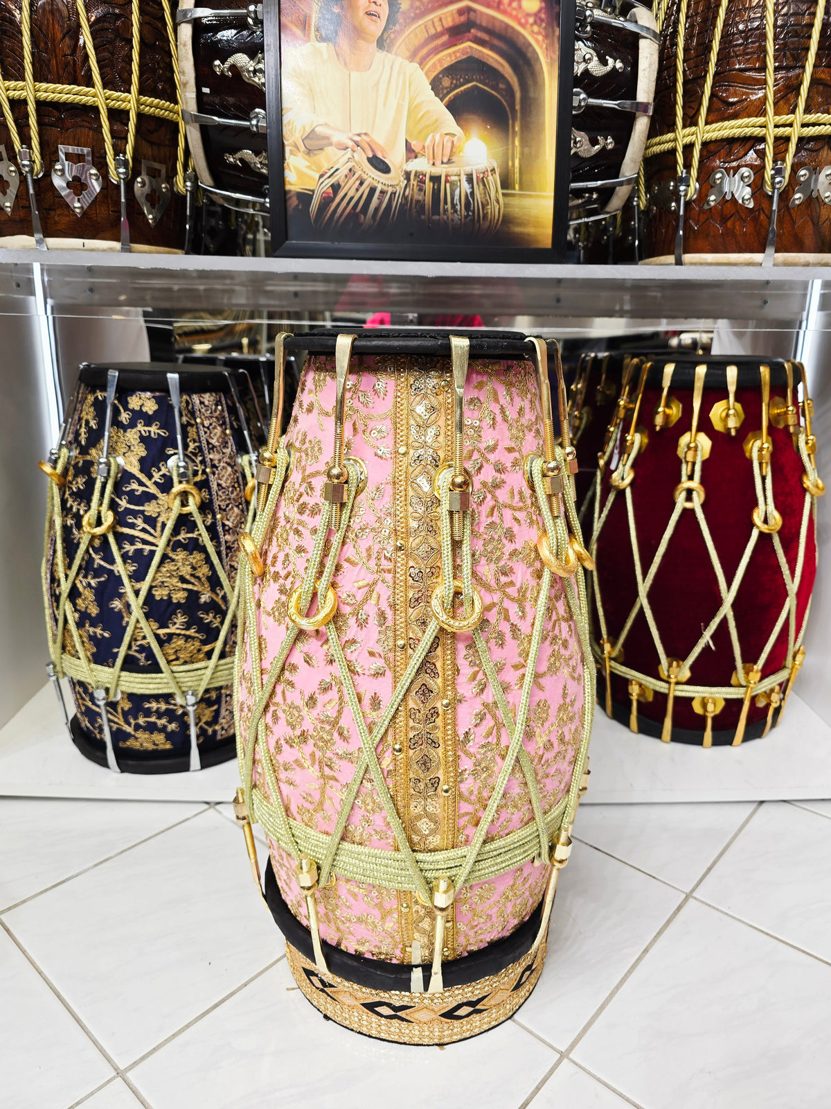 Gulzar Rosé — Pink Sherwani-Wrapped Red Sheesham Dholak · Black Skins · Gold Roping