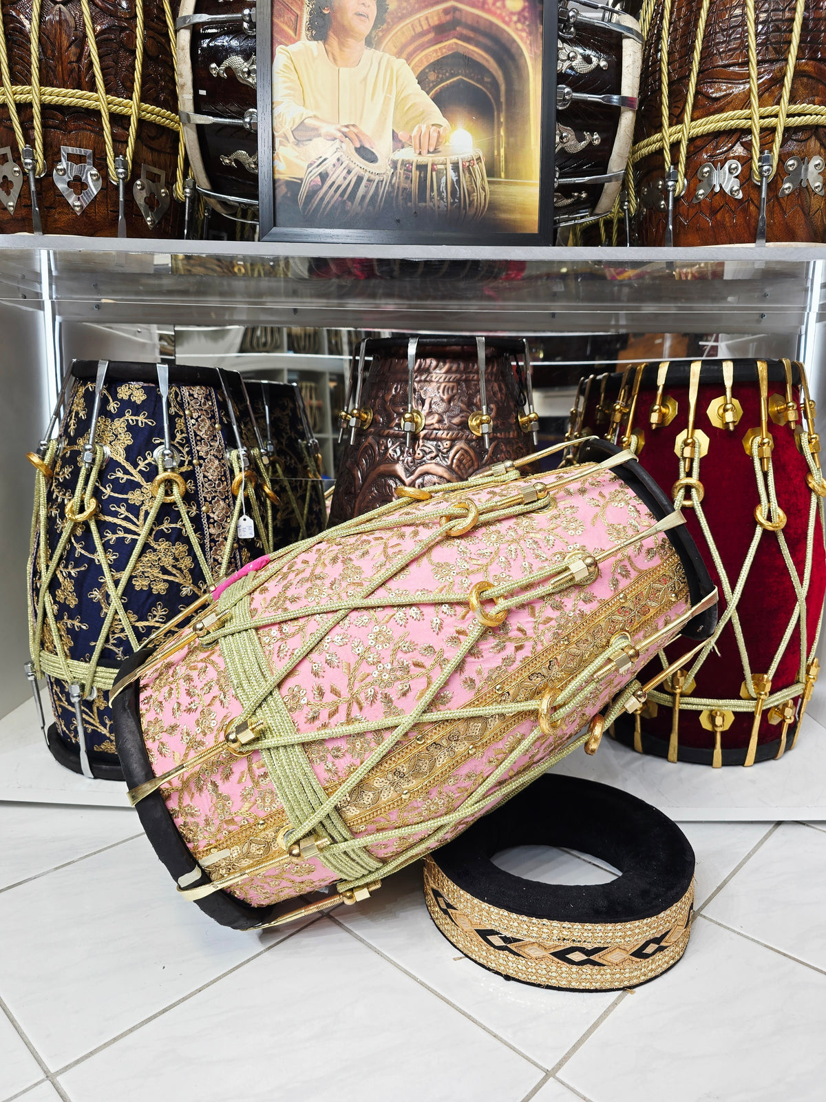 Gulzar Rosé — Pink Sherwani-Wrapped Red Sheesham Dholak · Black Skins · Gold Roping