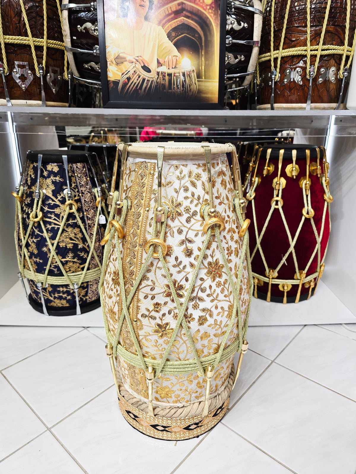 Aurelian Noor — Gold & White Sherwani-Wrapped Red Sheesham Dholak · Gold Roping *Exceptional Tone + Devin's Personal Dholak*