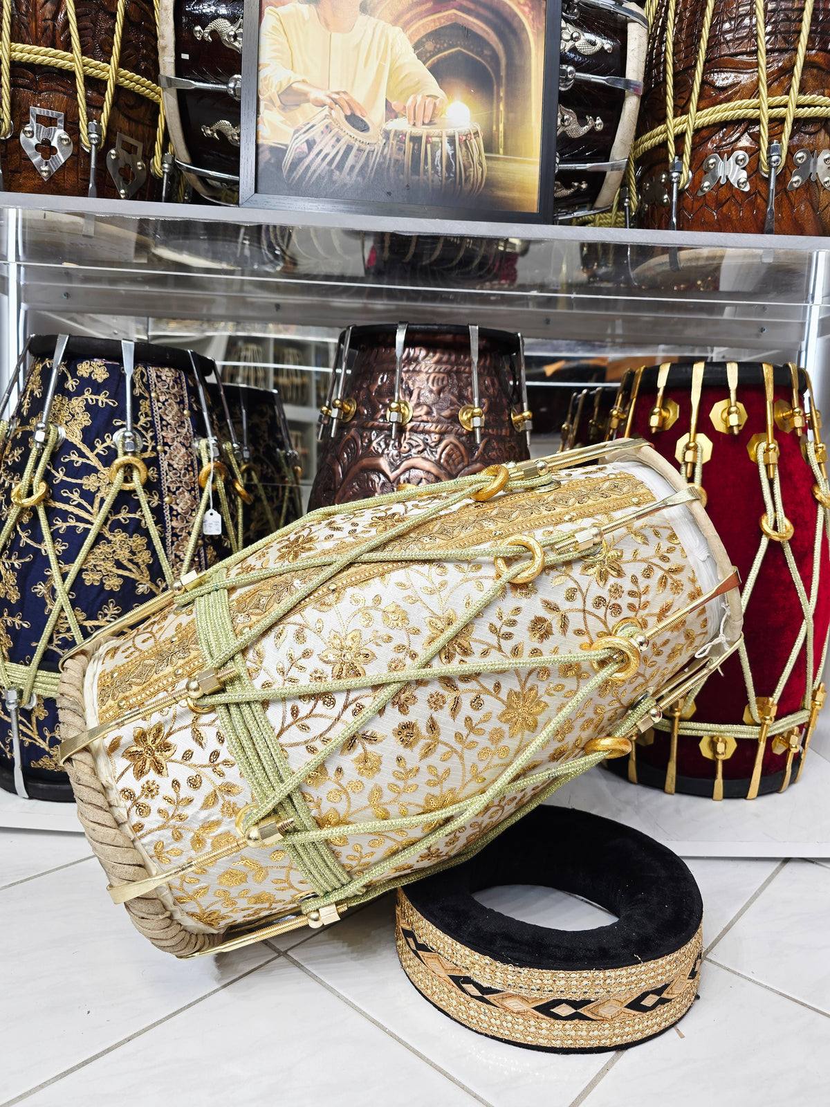Aurelian Noor — Gold & White Sherwani-Wrapped Red Sheesham Dholak · Gold Roping *Exceptional Tone + Devin's Personal Dholak*