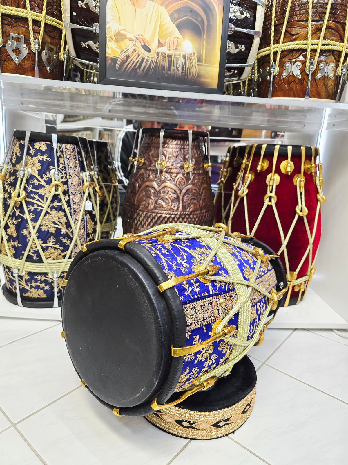Royal Heritage: Blue and Gold Sherwani Wrapped Red Sheesham Dholak with Reverse Syaahi Thin Rimmed Skin and Black Skins *Minor Cosmetic Defects *Exceptional Tone