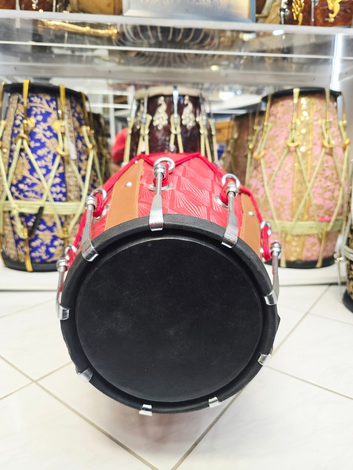 Laal Darbar – Premium Red Designer Leather Wrapped Red Sheesham Dholak | Red Cosmetic Ropes & Black Skins *Minor Cosmetic Blemish/ Tear *Exceptional Tone