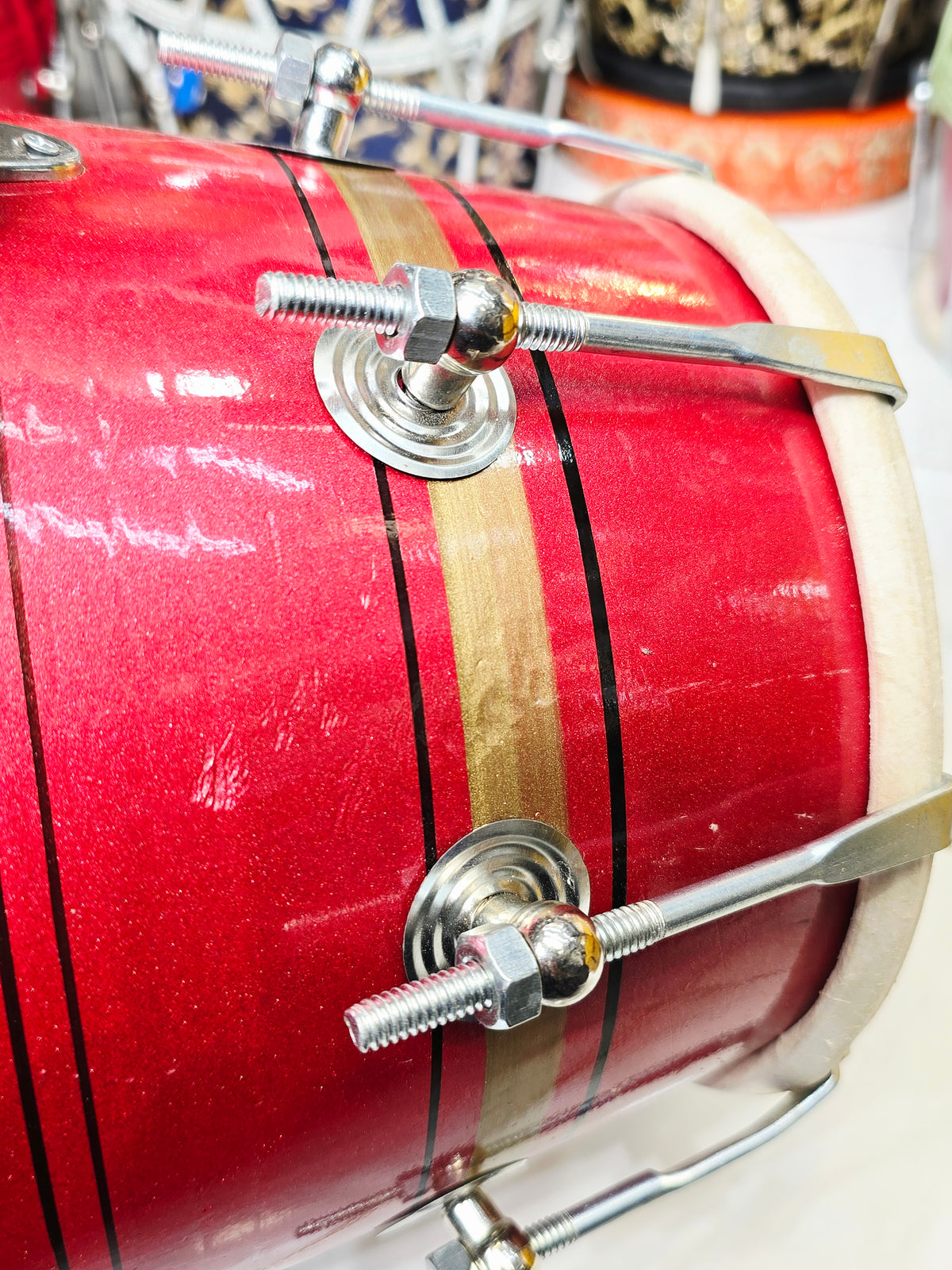 Lal Shakti – Metallic Crimson Red & Champagne Gold Striped Student Dholak with Black Pinstripes & Carrying Handle *Minor Cosmetic External Crack & Blemishes (R2)