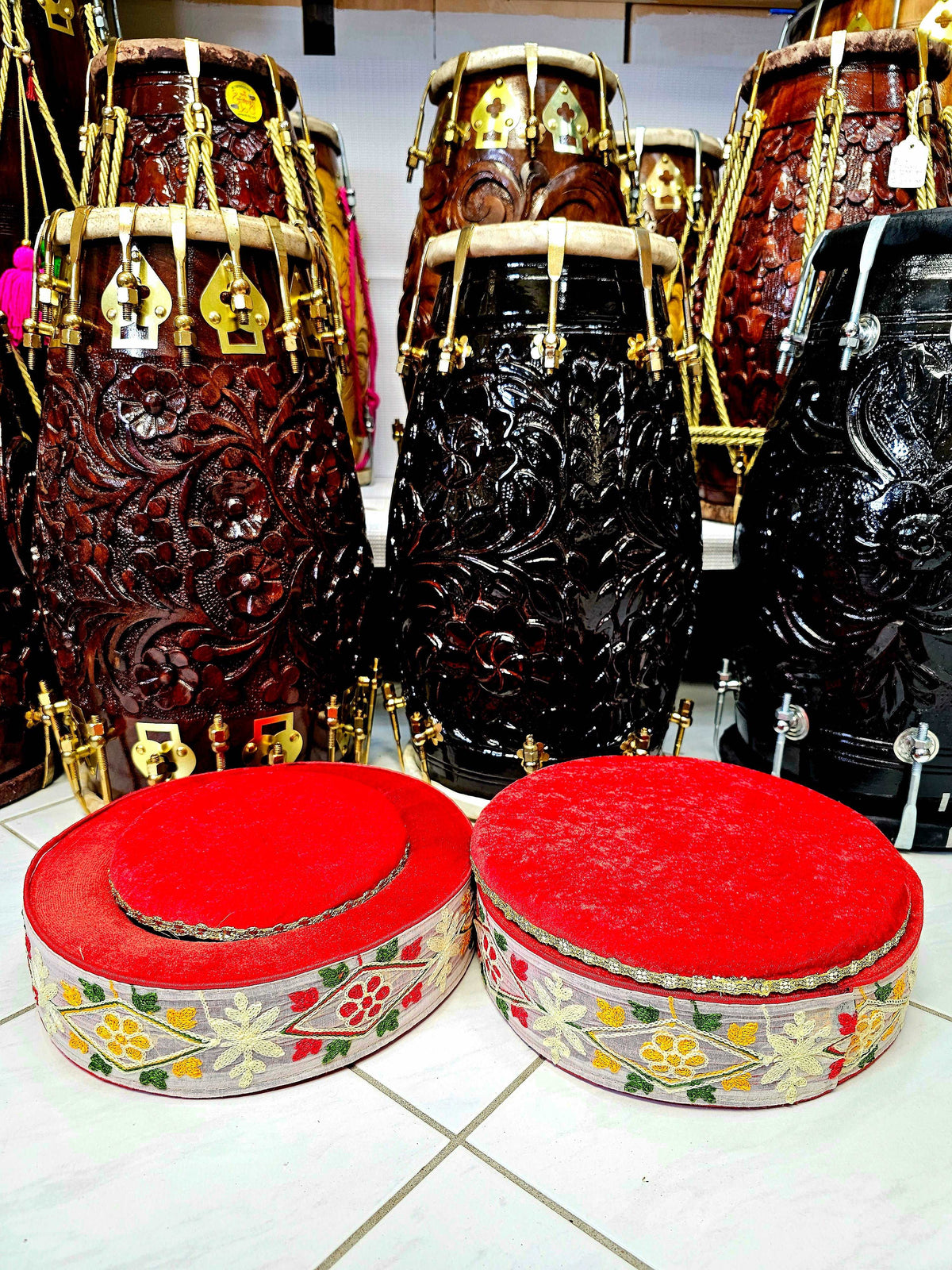 Artisanal Elegance: Premium Red Tabla Rings with Handcrafted Red, White, and Green Sewn Floral Design