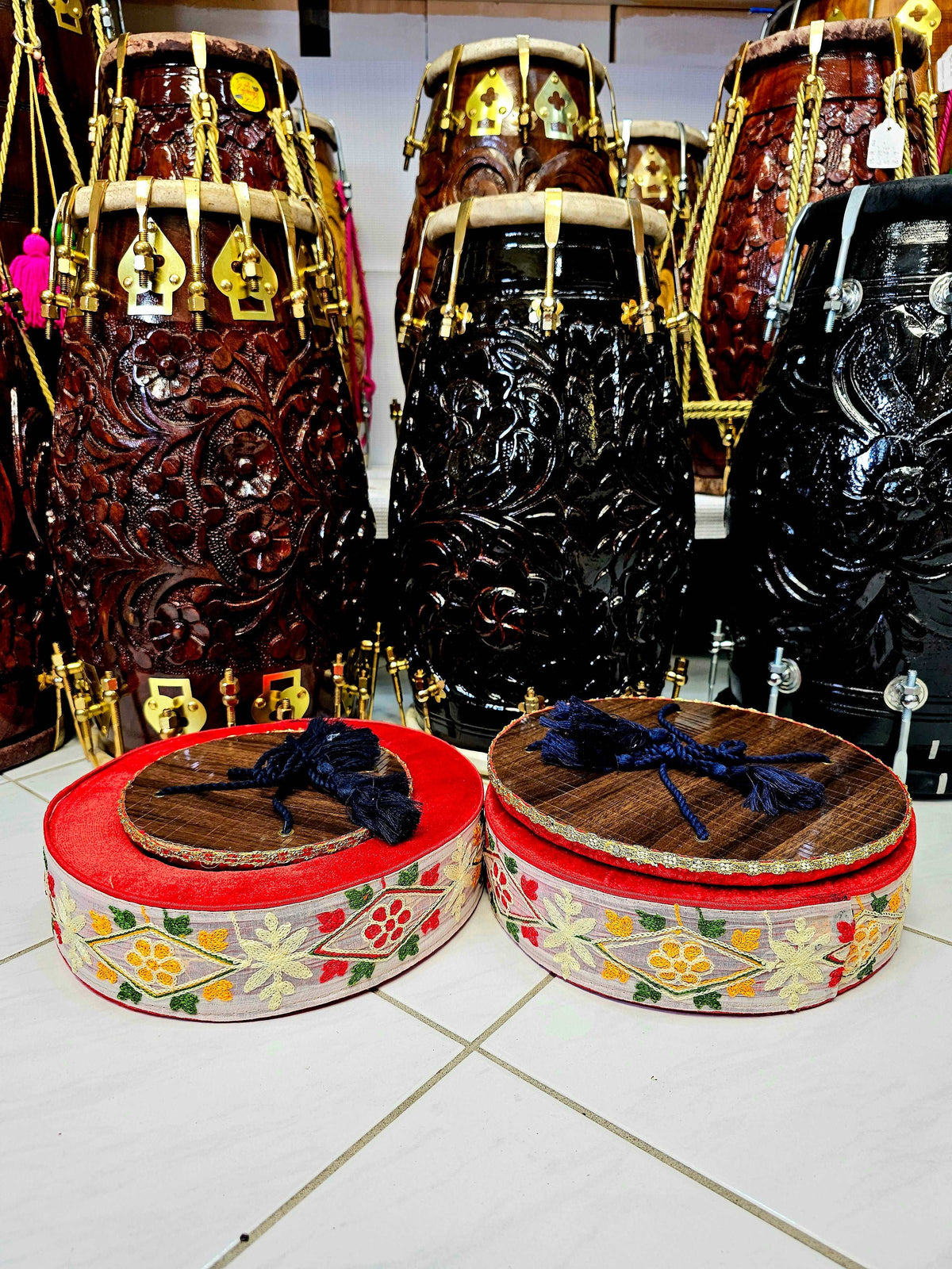 Artisanal Elegance: Premium Red Tabla Rings with Handcrafted Red, White, and Green Sewn Floral Design