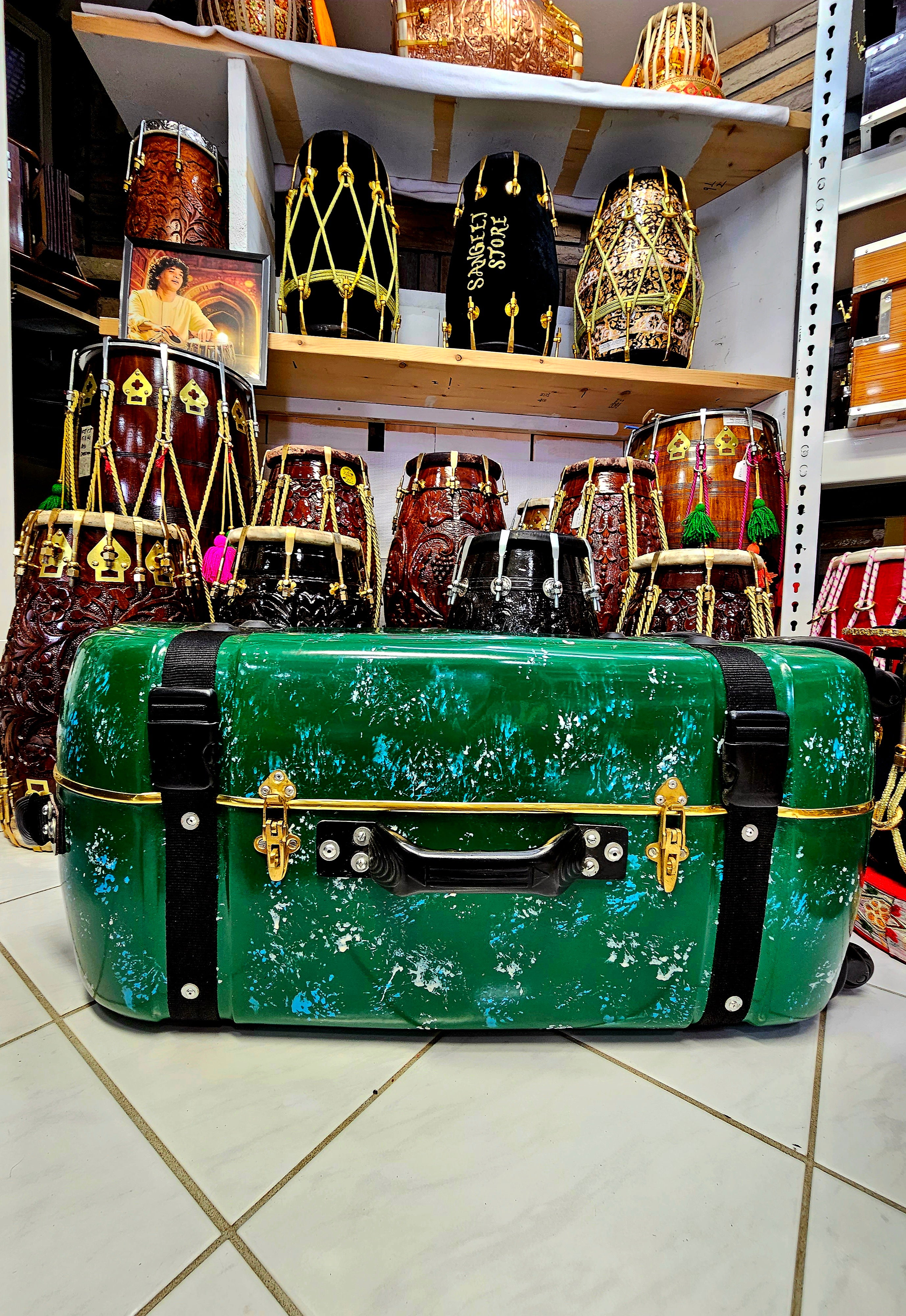 Eco-Enigma Green Tabla Travel Case with Teal and White Paint Splatter Artistry