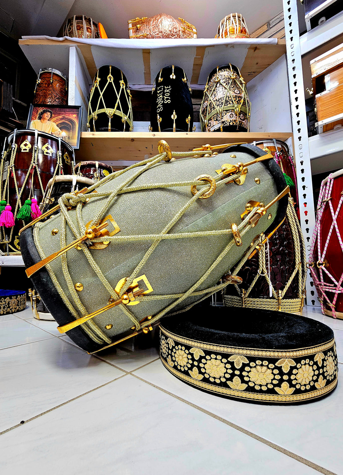 Radiant Rhythms: Sparkly Sherwani Wrapped Red Sheesham Dholak with Golden Brass Bolts and Black Pudis (Minor Fabric Rip Defects)