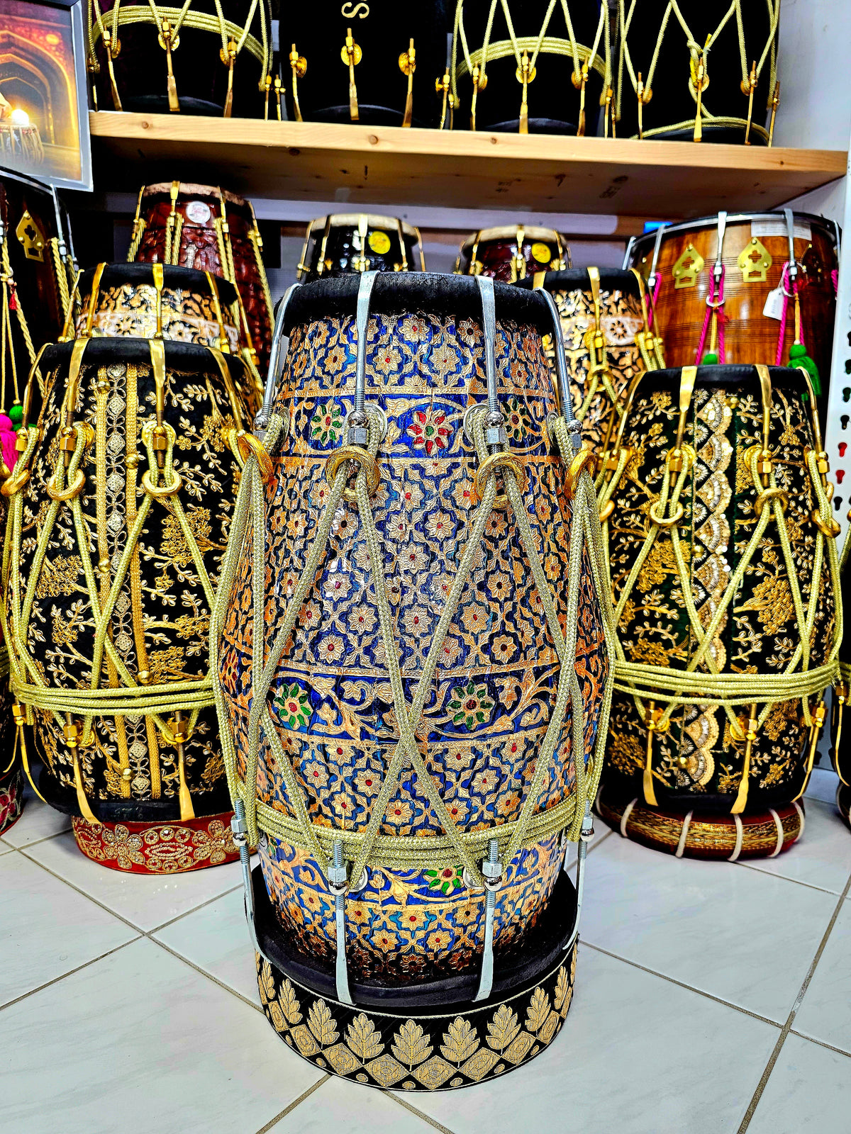 Harmony in Hues: Blue and Gold Designer Wrapped Red Sheesham Dholak with Black Skins and Chrome Bolts