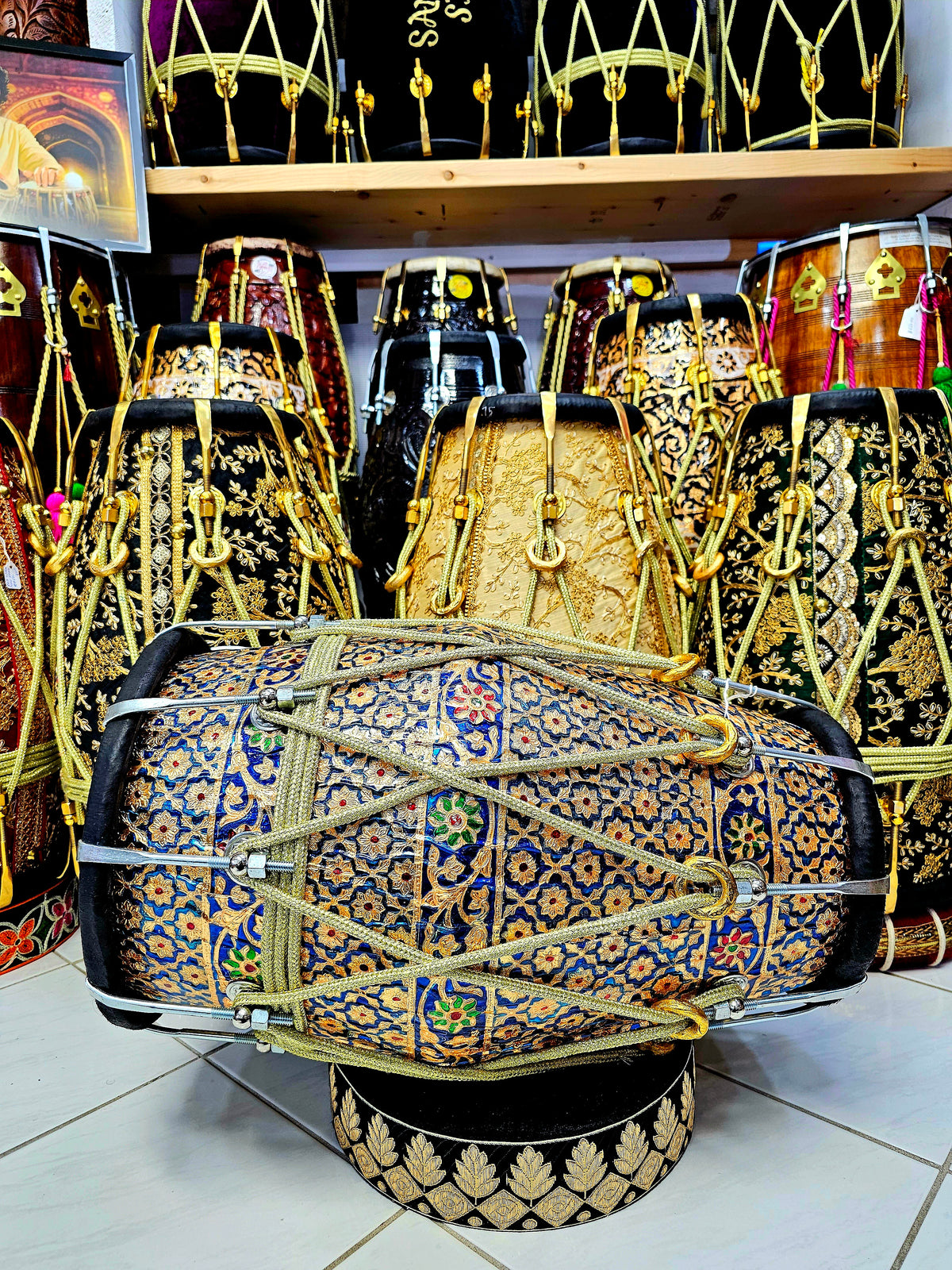 Harmony in Hues: Blue and Gold Designer Wrapped Red Sheesham Dholak with Black Skins and Chrome Bolts