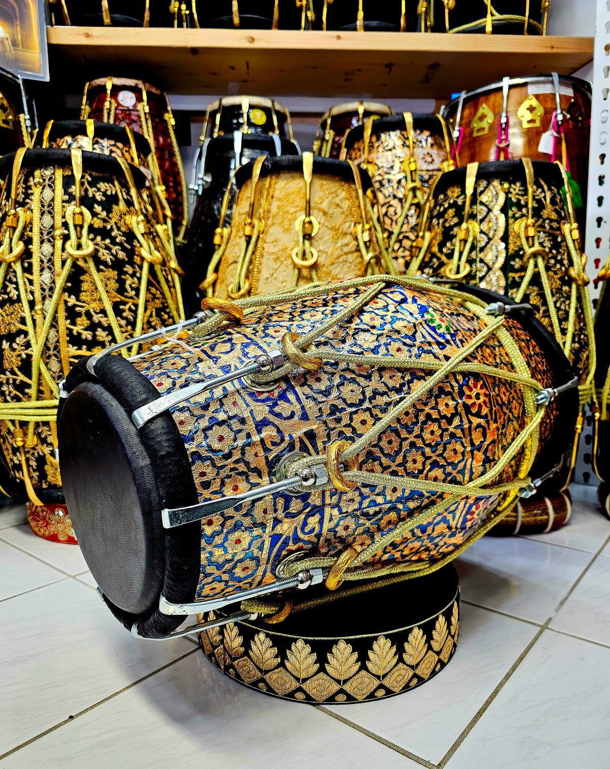 Harmony in Hues: Blue and Gold Designer Wrapped Red Sheesham Dholak with Black Skins and Chrome Bolts
