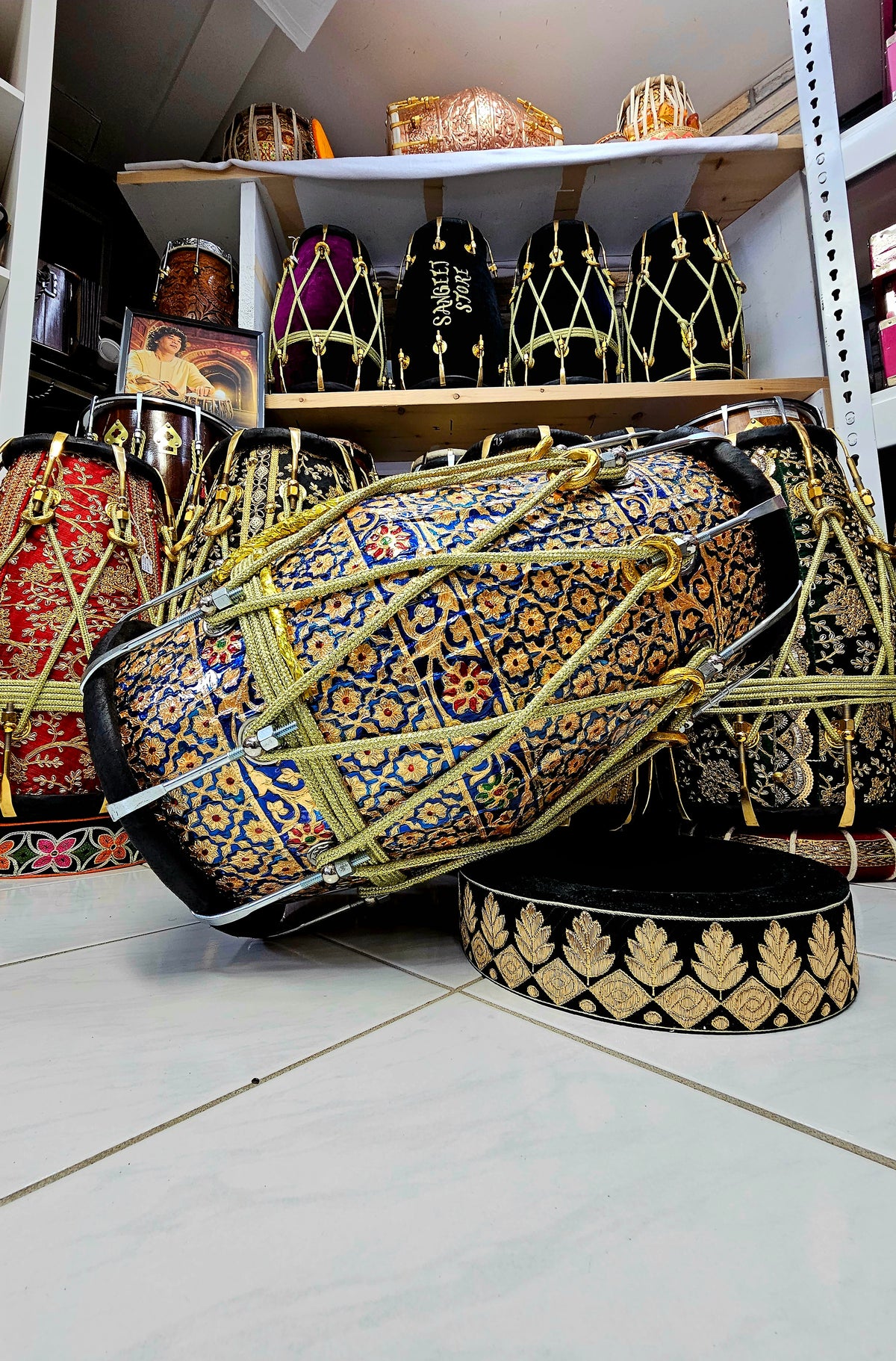 Harmony in Hues: Blue and Gold Designer Wrapped Red Sheesham Dholak with Black Skins and Chrome Bolts