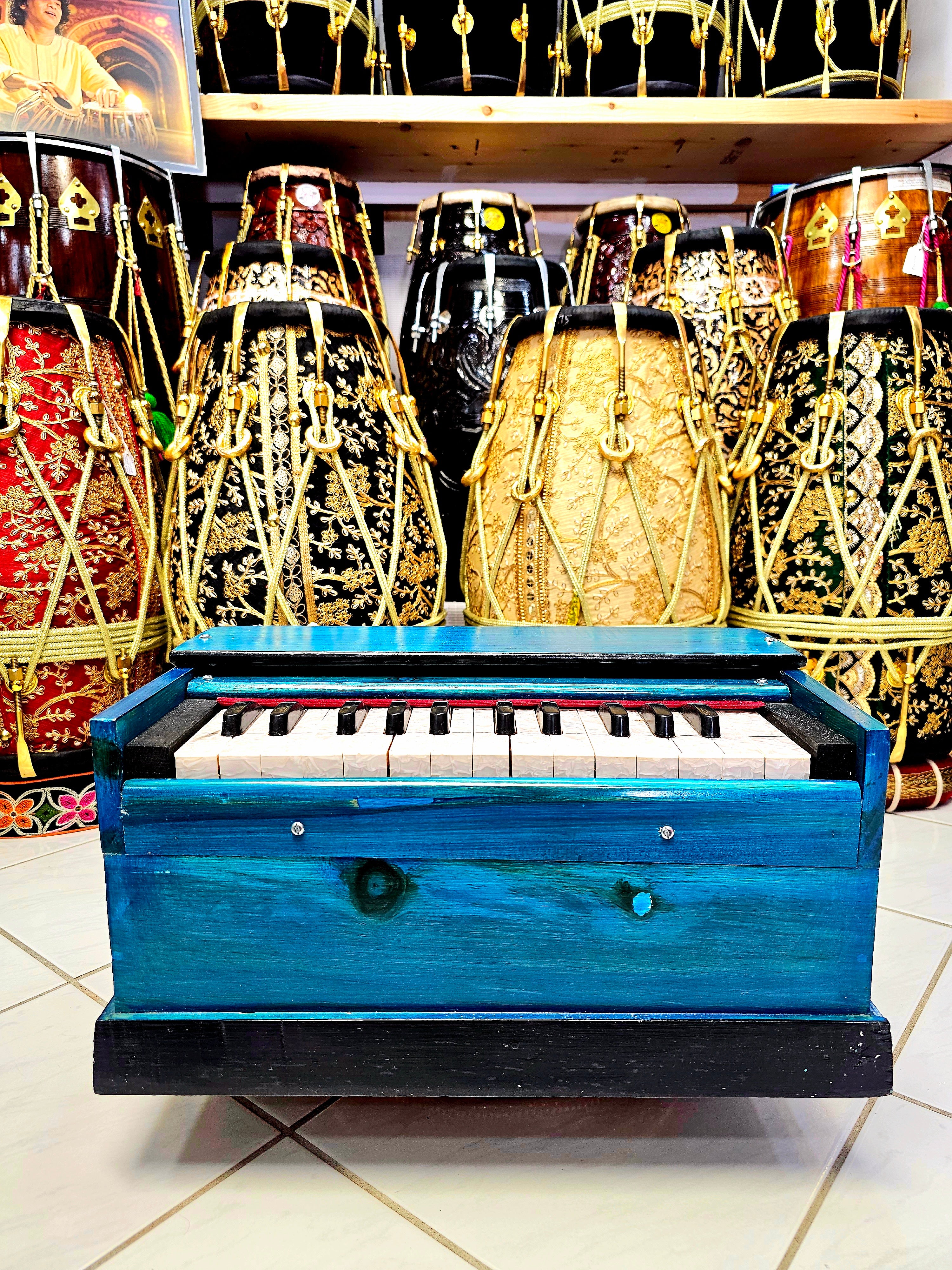 Tiny Melodies: Blue Painted Toddler Harmonium - A Symphony for Little Fingers