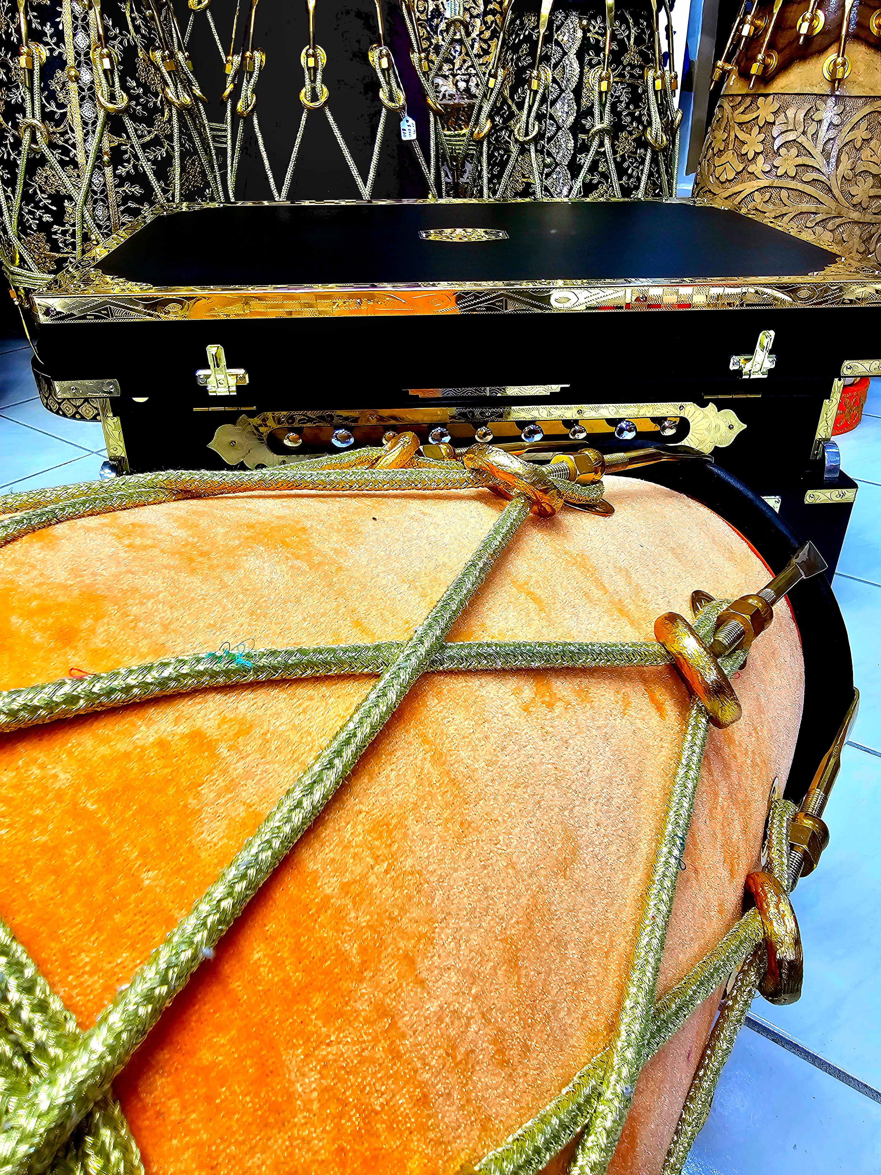 Peach Melody: Red Sheesham Dholak in Peach Velvet Wrap, Black Skins, Golden Brass Accents, and Intricate Rope Design