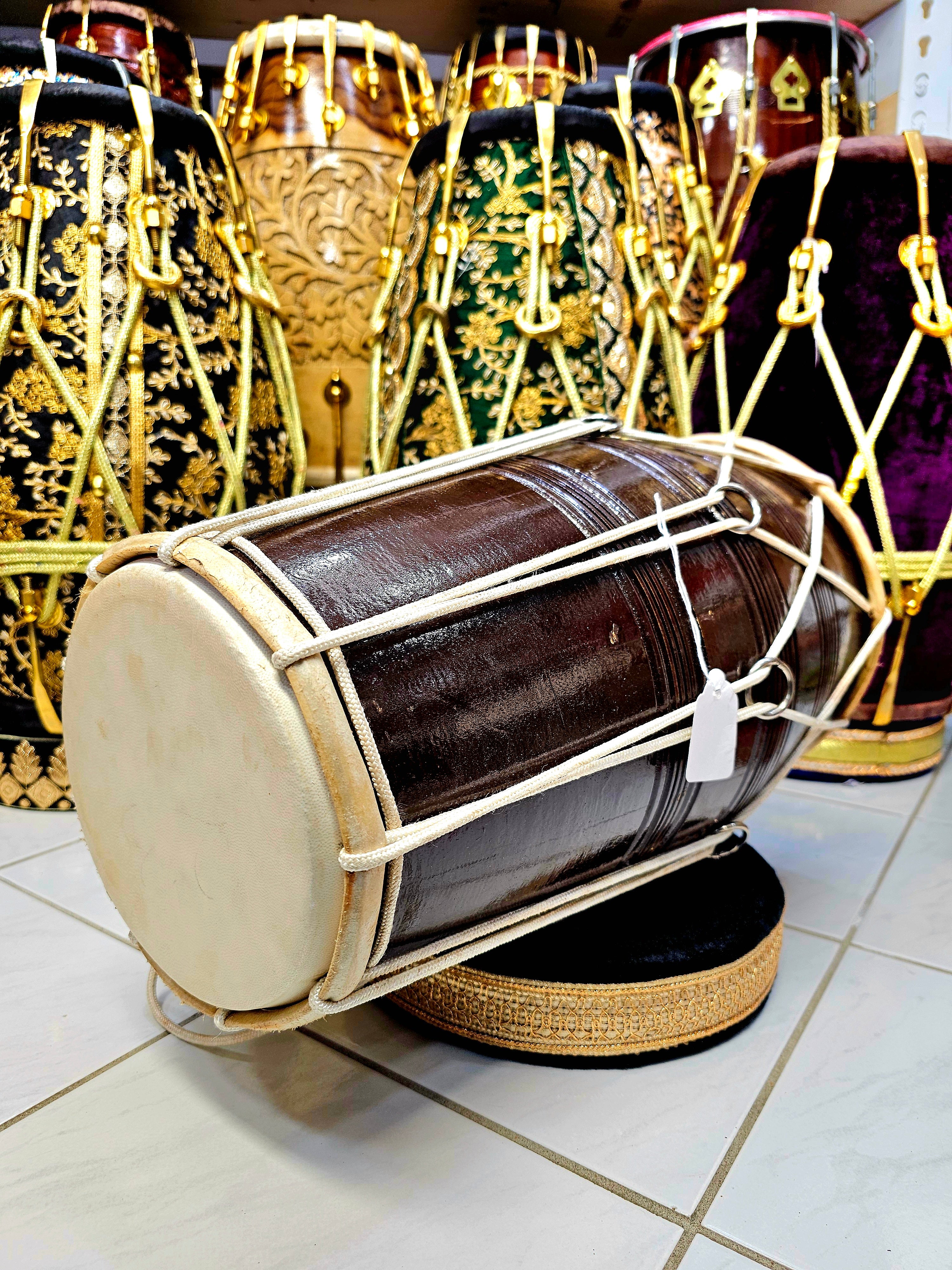 Natural Harmony: Brown Mango Wood Student Quality Roped Dholak
