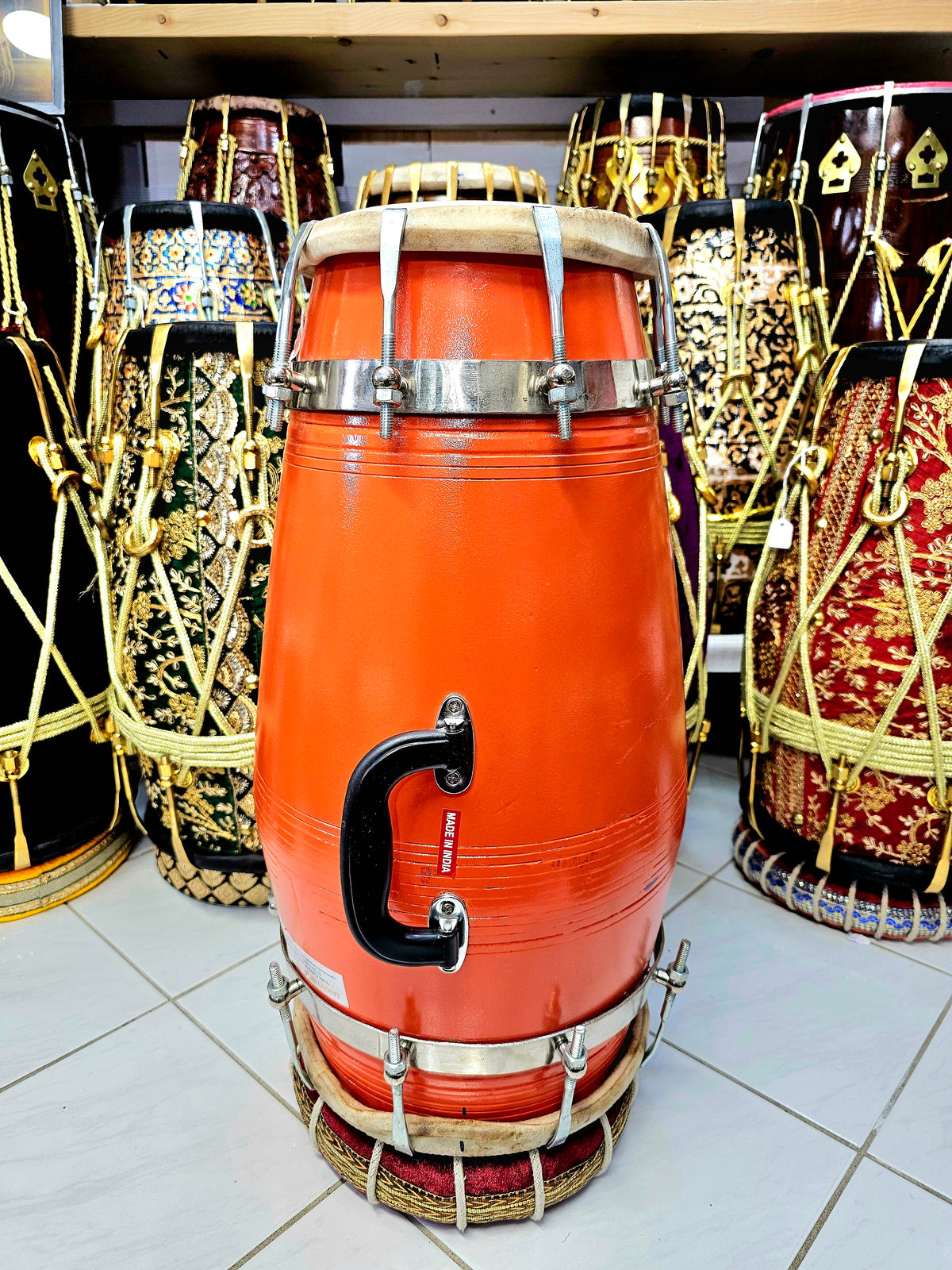 Sunburst Prodigy: Large Orange Professional Mango Wood Dholak with Minor Filled-in Cracks