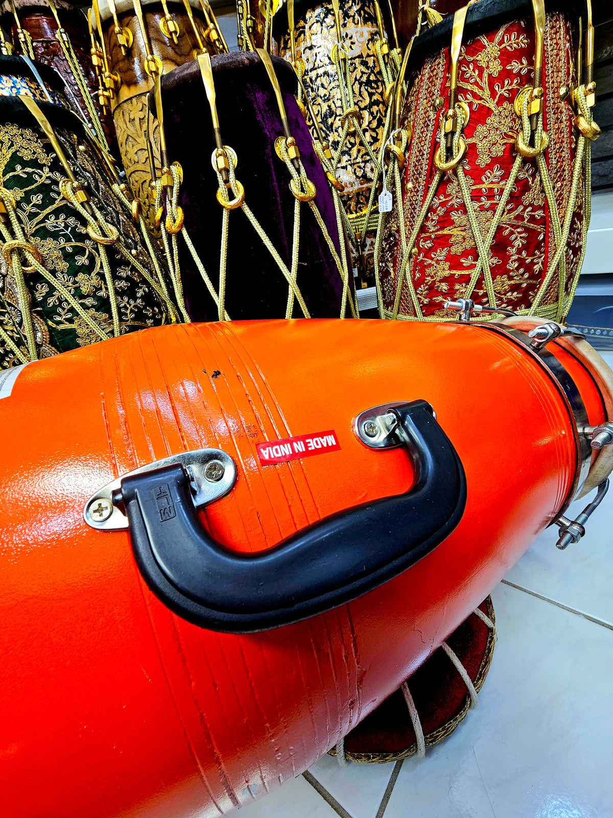 Sunburst Prodigy: Large Orange Professional Mango Wood Dholak with Minor Filled-in Cracks