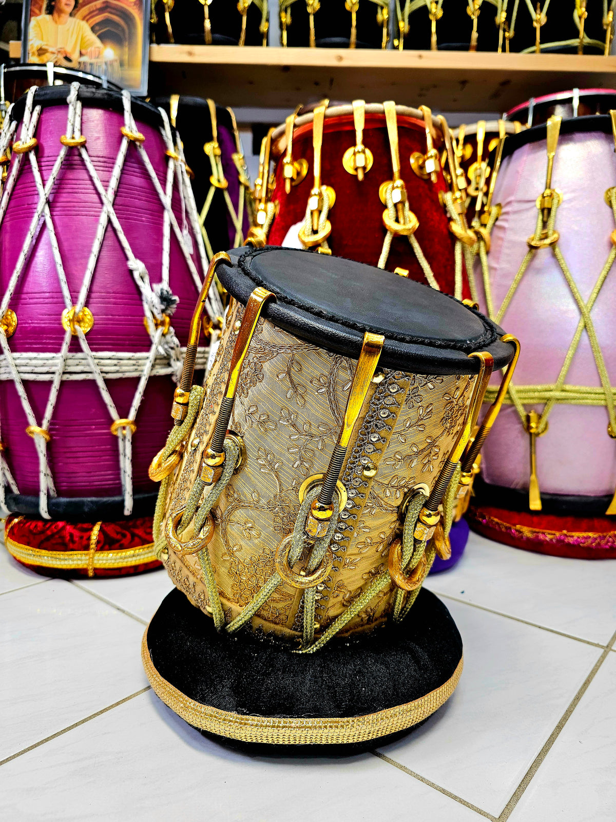 Majestic Golden Symphony: Golden Sherwani Wrapped Red Sheesham Reverse Syaahi Half-Dholak with Black Skin (Minor Discolorations), Golden Pure Brass Bolts, and Golden Ropes Design