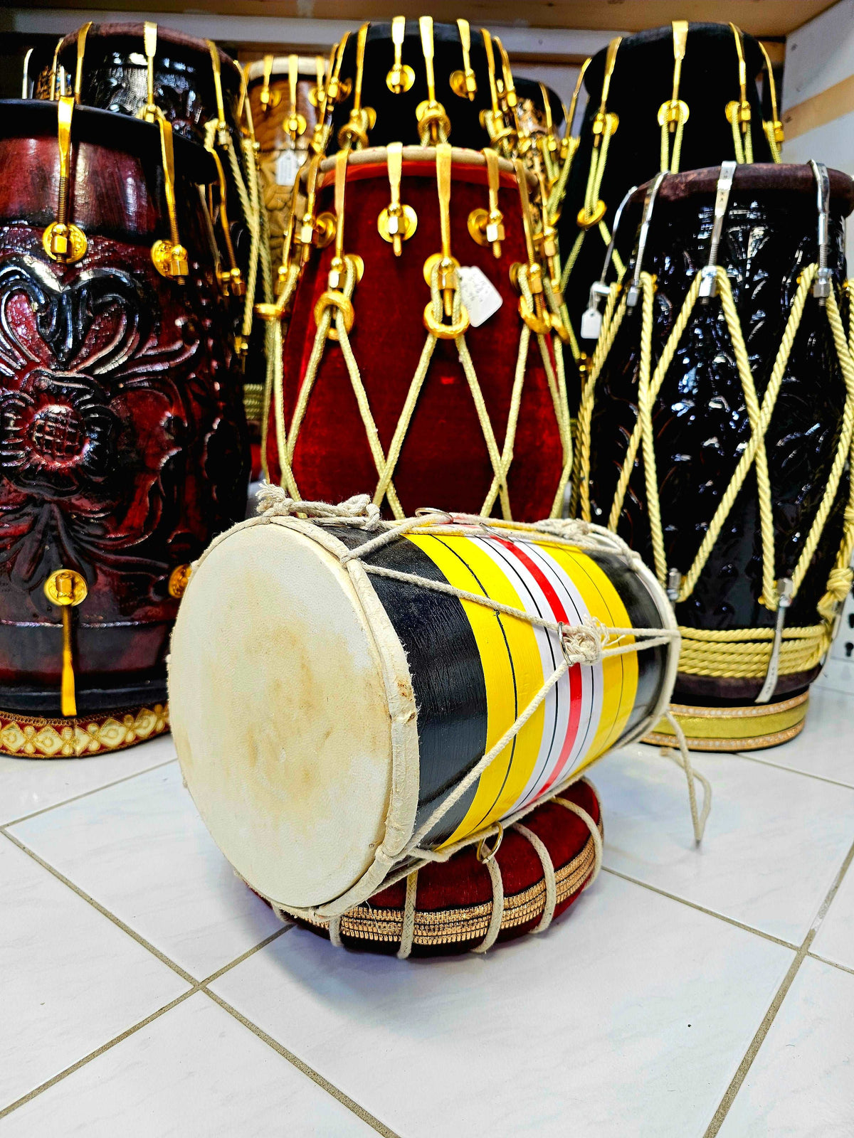 Black, Yellow, White & Red Striped Playable Toddler Dholak (1-3 Year Olds)