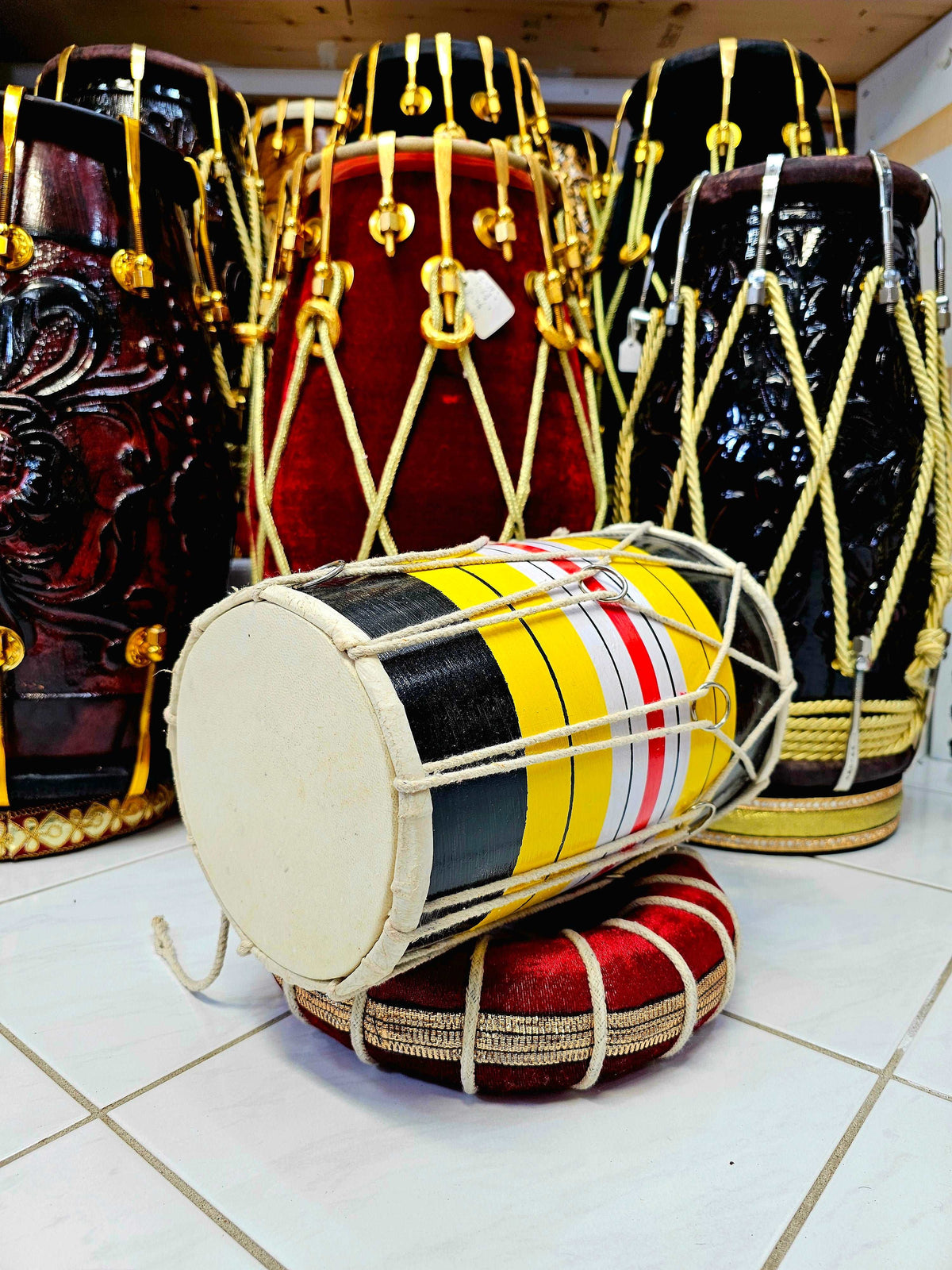 Black, Yellow, White & Red Striped Playable Toddler Dholak (1-3 Year Olds)