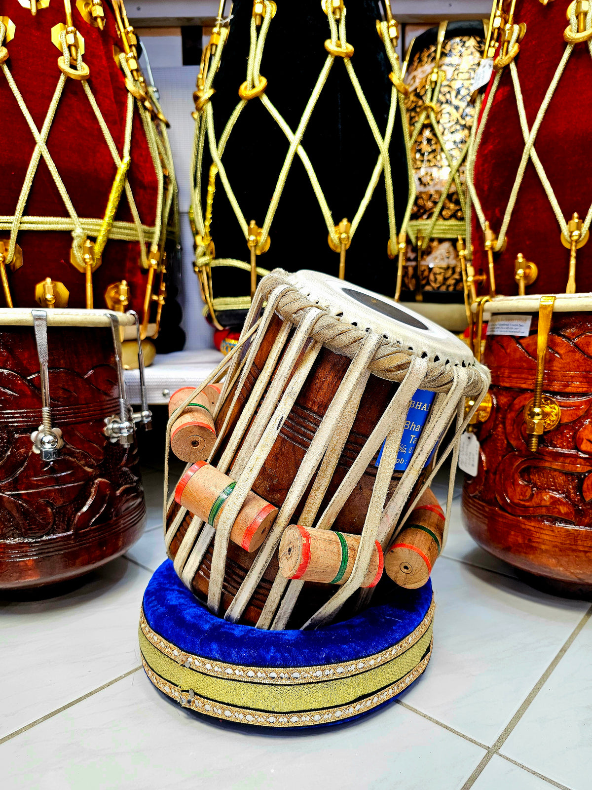 Mohammed's Custom Package: Tonal Serenade: 5.75" Red Sheesham E/F/F# Bharat Kakade Dayan + 4 Professional Skins + 4 Concert Quality Straps (Balance Payment Link)