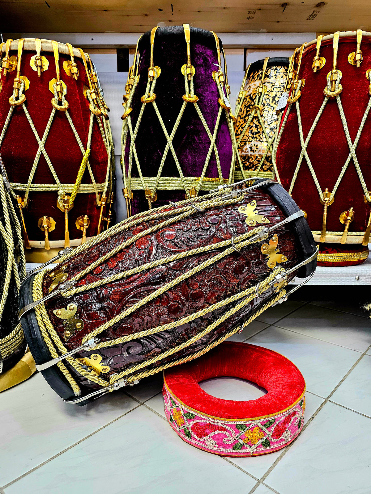 Majestic Carve Chetram Dholak: Premium Sheesham with Chrome Bolts, Golden Ropes, and Black Skins