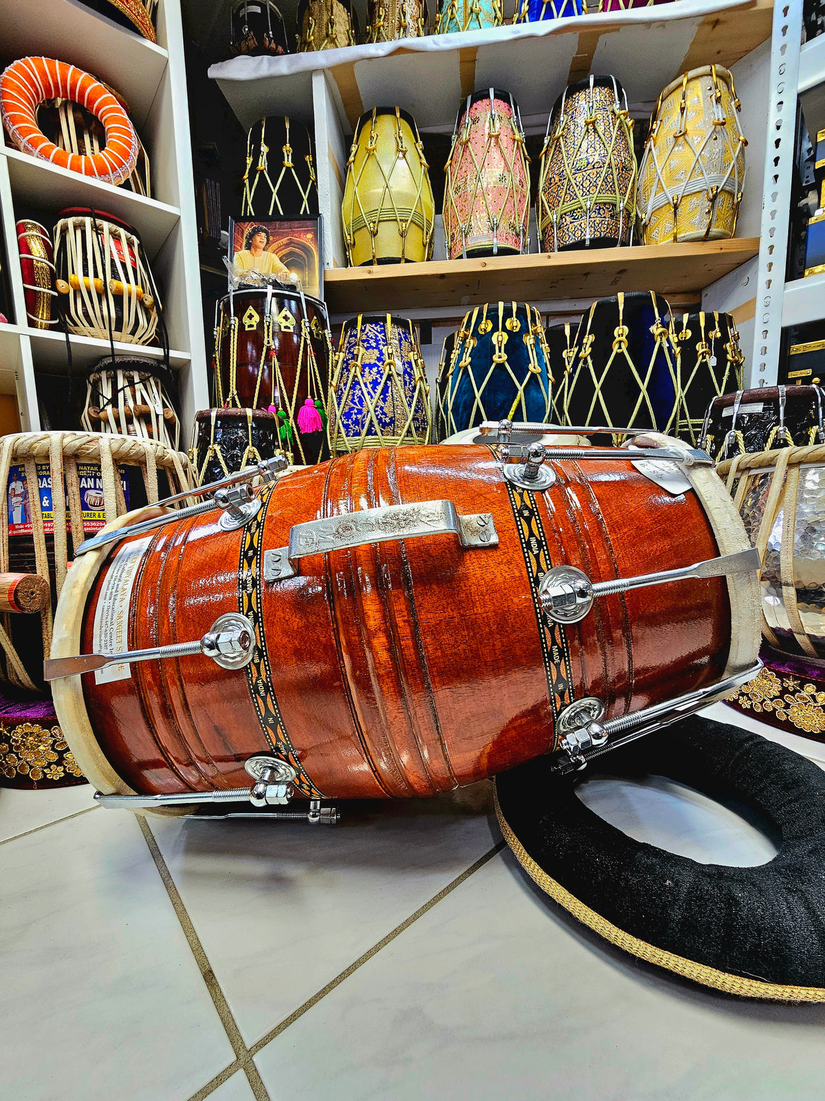 Echoes of Tradition: Glossy Traditional Red Sheesham Bina Dholak with Rusted Handle