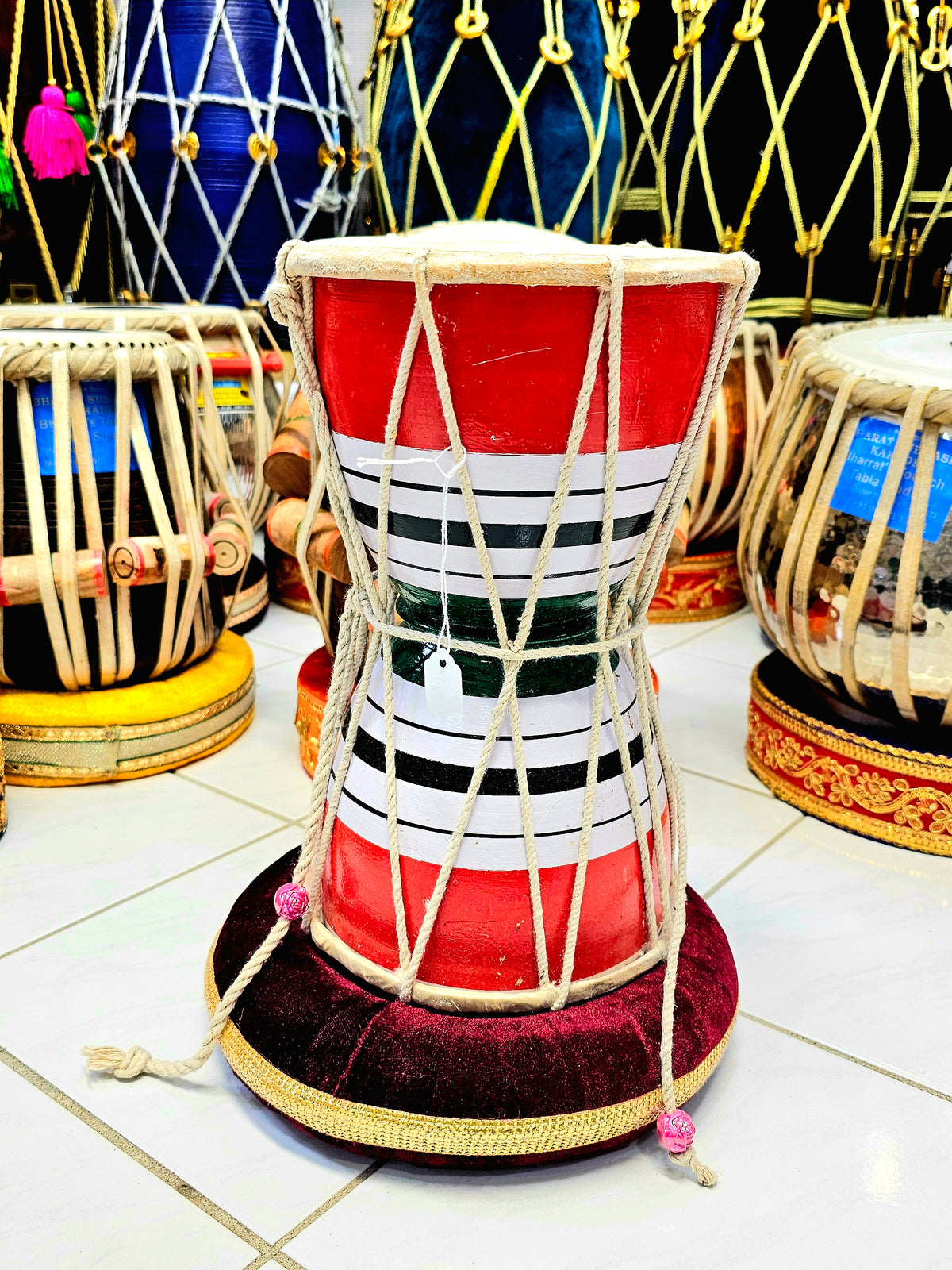 Trinity Rhythm Damru: Red, White, Black with Vibrant Green Core - Sangeet Store