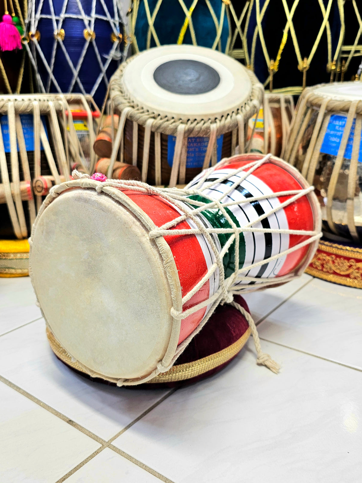 Trinity Rhythm Damru: Red, White, Black with Vibrant Green Core - Sangeet Store