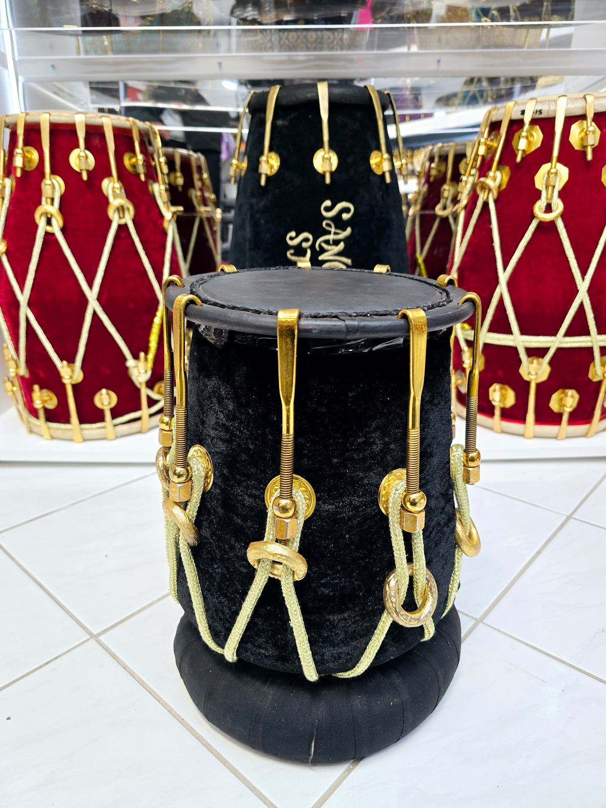 Eclipsed Harmony: Red Sheesham Dholki-Tone Half-Dholak with Black Velvet Wrap, Golden Brass Bolts, and Ebony Black Skin