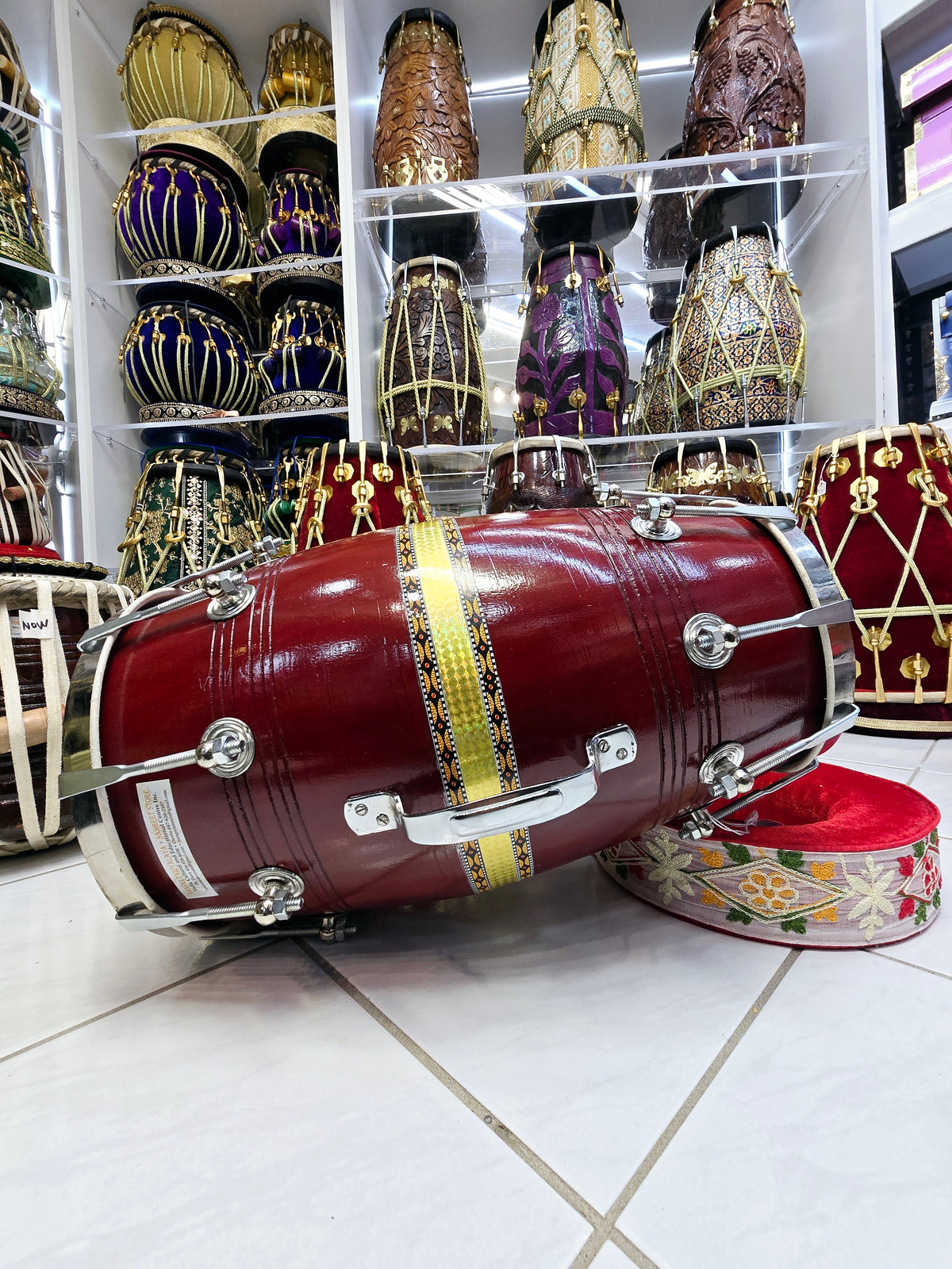 Crimson Crest Dholak – Red Sheesham with Gold Center Strip, Metal Rim & Handle (Minor Defects)