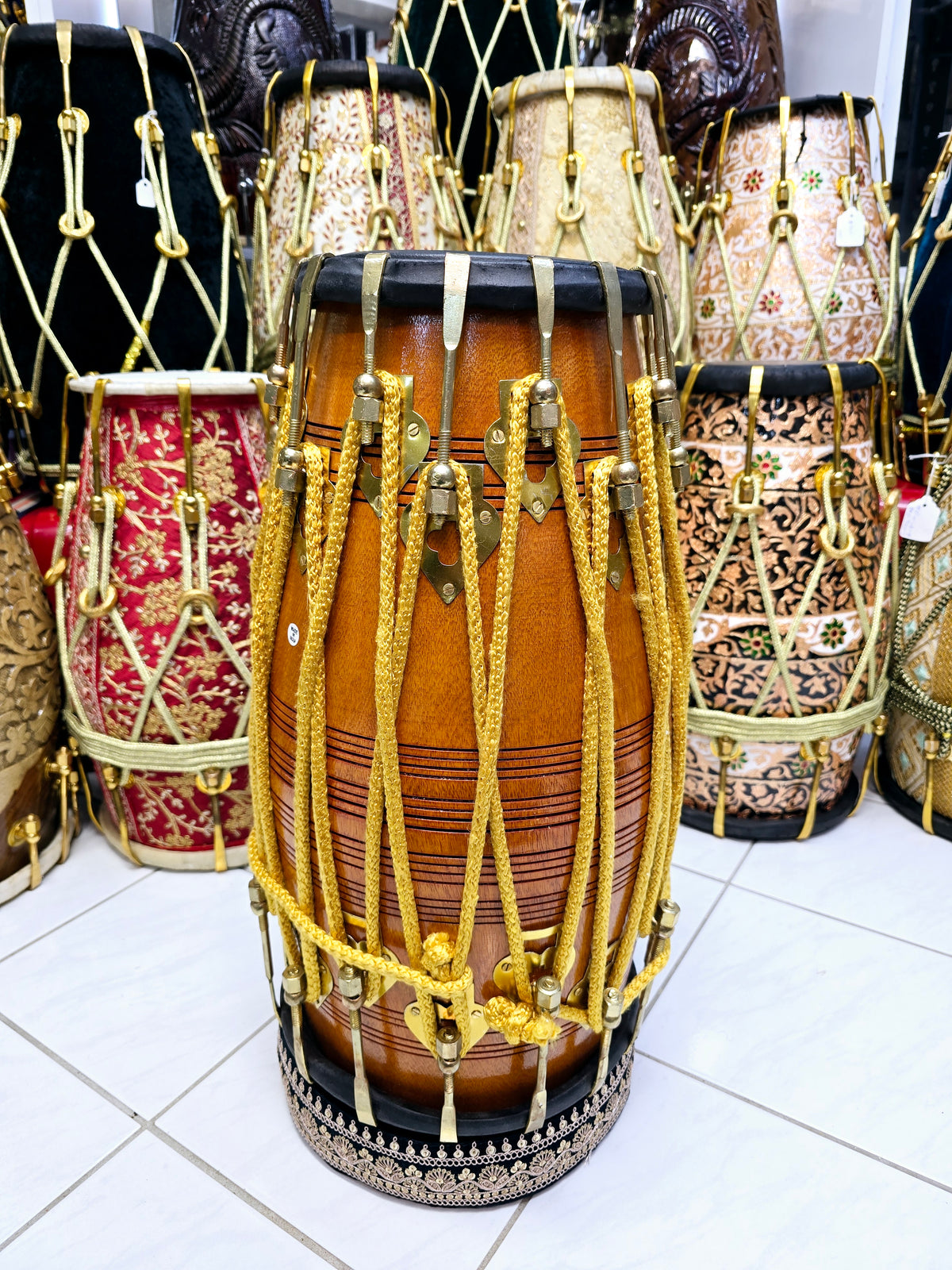 Golden Echo: Traditional Red Sheesham Professional Double Bolted Dholak with Golden Coated Brass Bolts, Black Skins, and Yellow Ropes Design