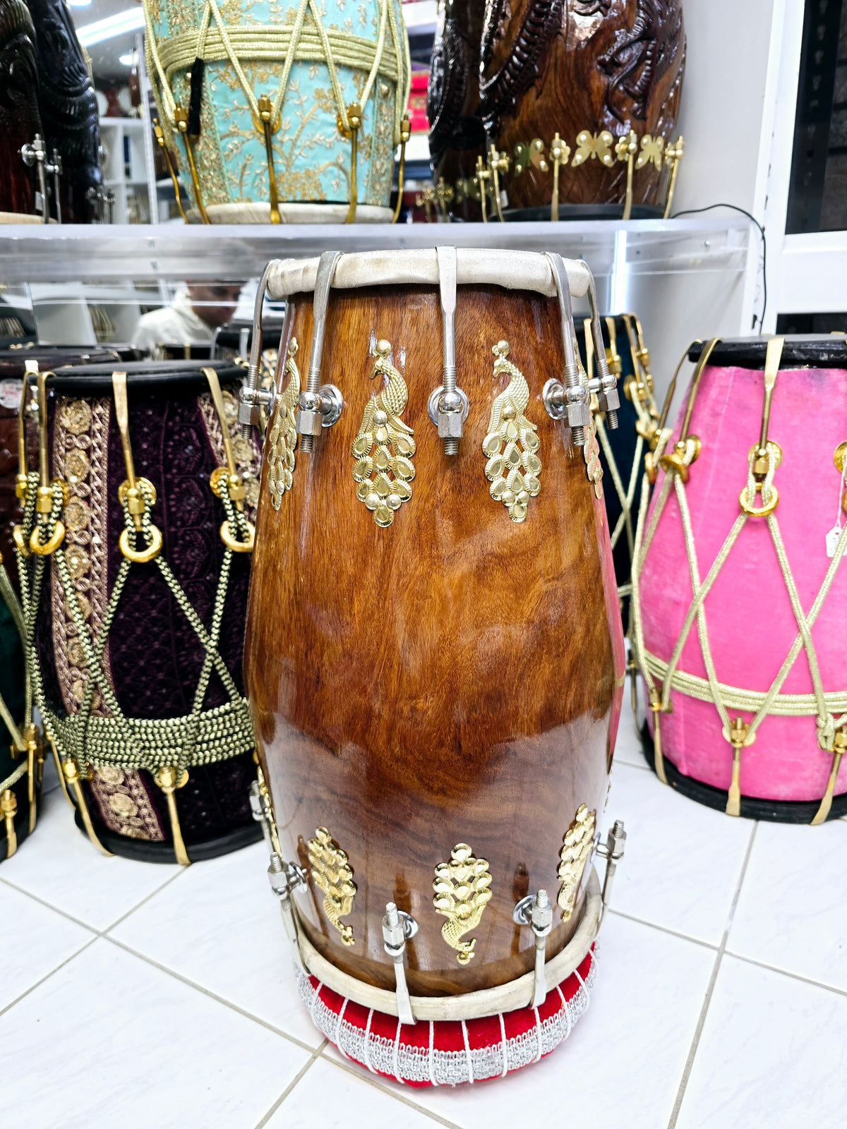 Mayurdhwani™ by Chetram Gill | Red Sheesham Dholak, 16 lbs with Gloss Finish, Golden Peacock Accent & Chrome Bolts