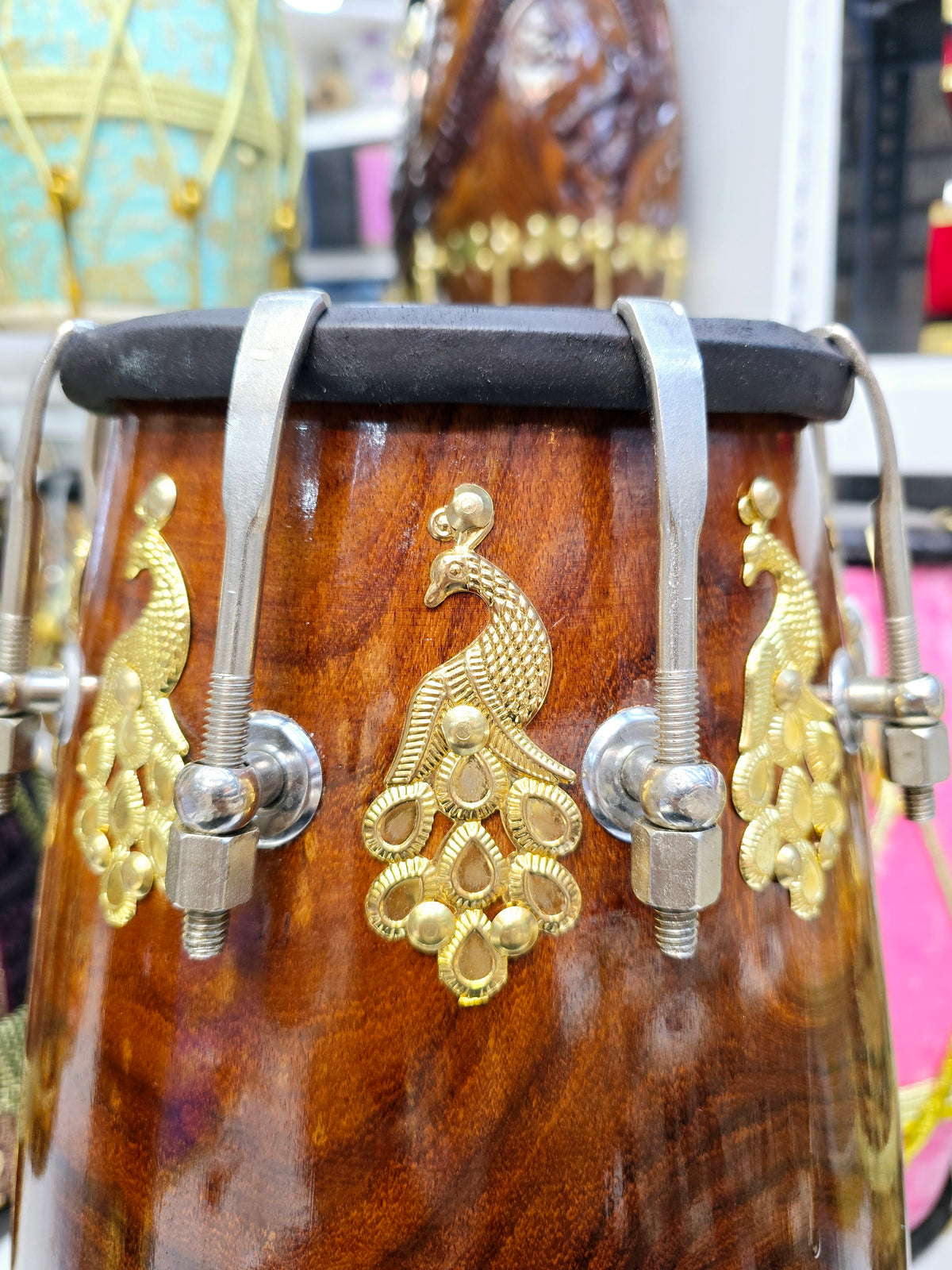 Custom Package Balance Link for Ashwien: Mayurdhwani Noir™ by Chetram Gill – Red Sheesham Dholak, 18 lbs with Black Skins, Golden Peacock Accent & Chrome Bolts + 2 Sets of Golden Bolts + 2 Replacement Skins + 3 Chetram Gill Skins