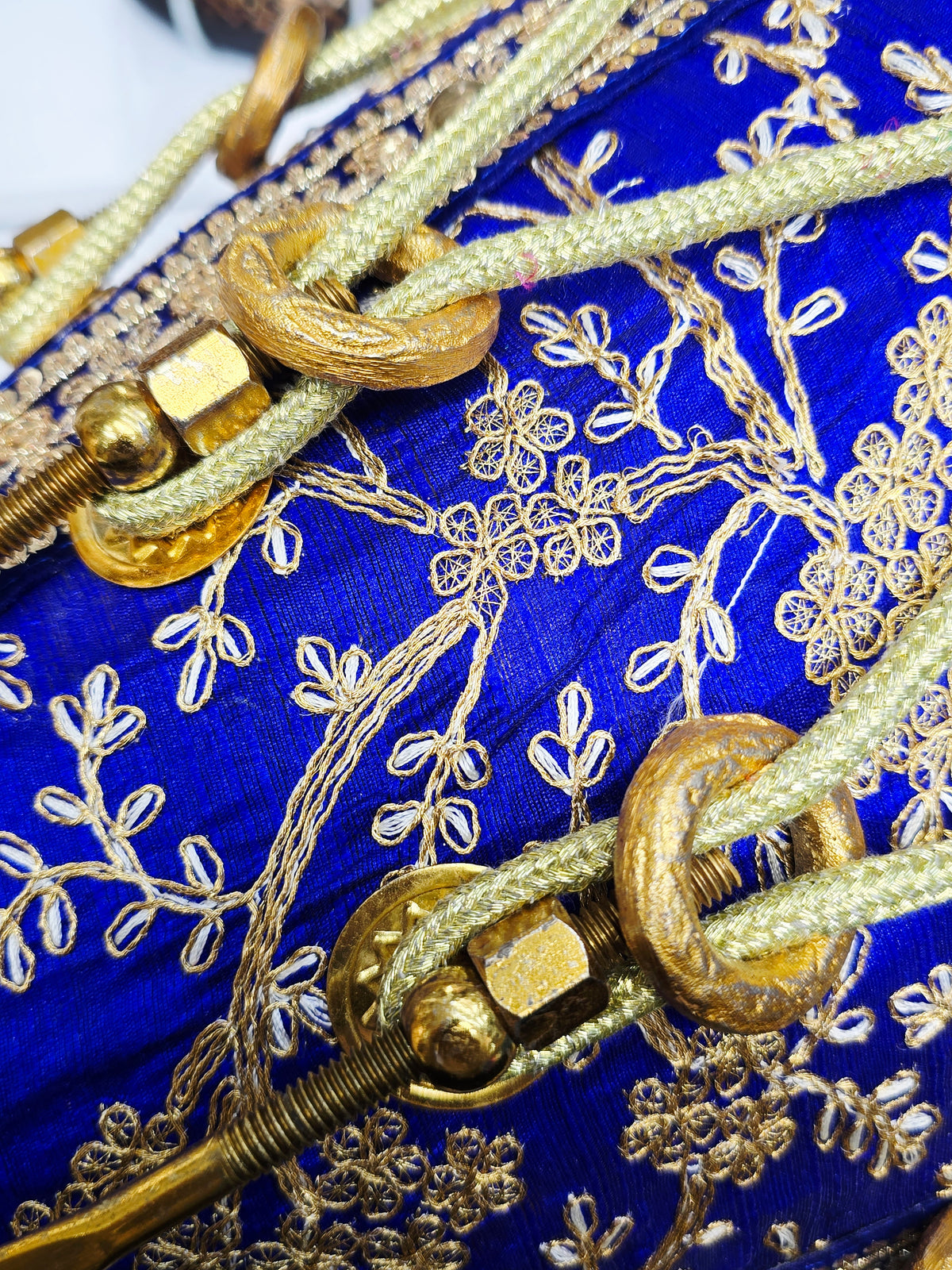 Royal Heritage: Blue and Gold Sherwani Wrapped Red Sheesham Dholak with Reverse Syaahi Thin Rimmed Skin and Black Skins *Minor Cosmetic Defects *Exceptional Tone