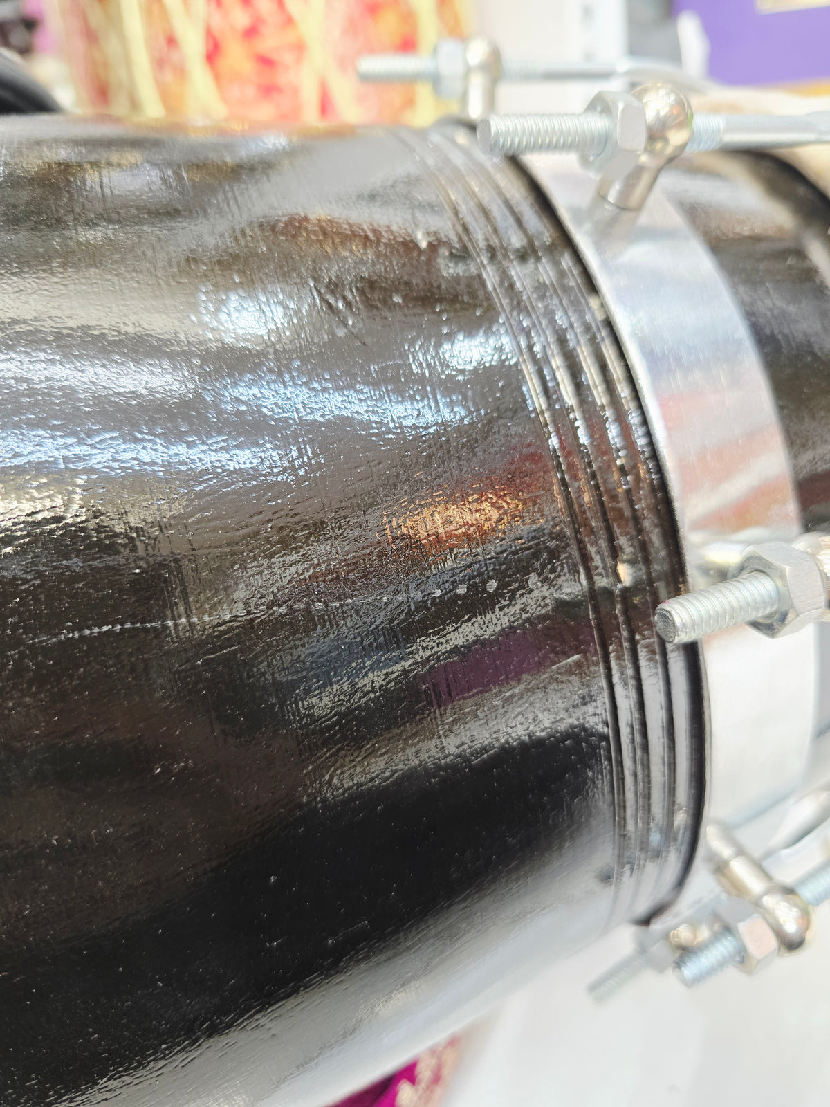 The Onyx Sonic Dholak - A Black Professional Red Sheesham Dholak with Chrome Bolts, Metal Rings and a Handle! Adj for Expedited shipping
