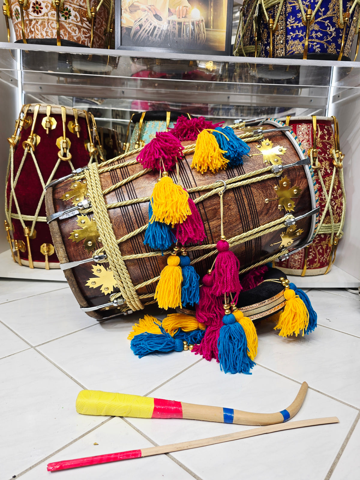 Naadrang — 20.5" Mid-Sized Red Sheesham Punjabi Dhol with Multicolor Tassels Mediocre Sound
